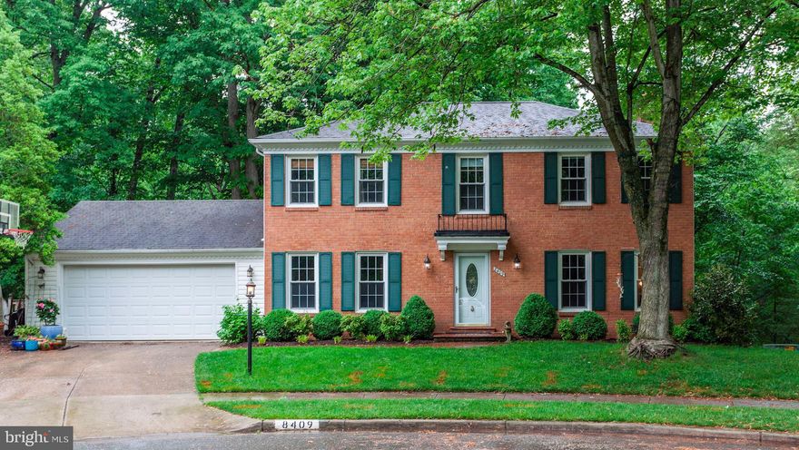 Beautiful & Amazing Brick Front Home with Two Car Garage on Cul-de-sac Backing to Trees and Parkland.  Four Bedrooms, Two Full and One Half Bathroom.  Huge deck for entertaining overlooking parkland. Updated kitchen features granite countertops and stainless steel appliances.  Main level features hardwood floors.  Main level includes kitchen, living room, dining room and family room with fireplace.  Four large bedrooms on upper level.  Master bedroom with walk-in closet and updated full bathroom.  Spacious lower level basement with open family room area, office and sliding glass door to rear yard.