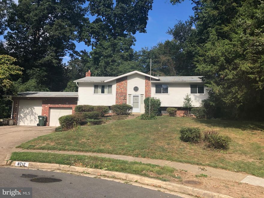 Fixer Upper! Great home in Kings Park community! Priced to sell! This split level home with two-car garage is situated in a cul-de-sac and convenient to local shopping, dining, and commuting into DC! If you're looking for a home to truly make your own, look no further!