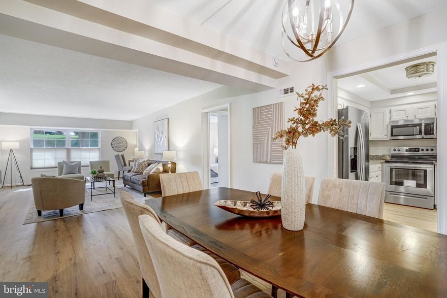 Welcome to Unit #109 at 7640 Provincial Drive at the Colonies of McLean, a sought after gated community close to Tysons Corner.  Sited on 29 serene and green acres, The Colonies delivers resort-like living with amenities like swimming, tennis, walking trails, playground, club house, community events and activities, and even a koi pond!  This community is pet friendly, has on-site management and grounds crews, and ample guest parking. 

Your home within this beautiful setting offers up one of the largest 2-bedroom floor plans in The Colonies and features a super smart layout and updates throughout, abundant closets (many with built in organizers),  an extra large living area, separate dining area,  and a spacious and bright kitchen with granite counters, quality stainless steel appliances, recessed lighting, tray ceiling, and a pantry.  Other upgraded features include updated bathrooms (each with classic subway tiling and elegant lighting, large storage vanities with stone tops, and lovely tiled flooring), brand new LVP flooring in the living space, and recent Andersen replacement windows throughout.   Rounding out the offerings of this beautiful home are the covered dedicated parking, an extra storage unit, and an in-unit high-end washer and dryer.  

Adding to all this, you'll enjoy the superb location that has you within moments to all of the shopping, dining and entertainment venues offered at Tysons Corner.  Commuting is a breeze with the McLean Metro Station less than a mile away (with an easy walking trail from the community), and super quick access to major travel routes (the Beltway, Route 66, and Route 123 for a super quick and direct way into the city).  

Don't miss this beautiful home!