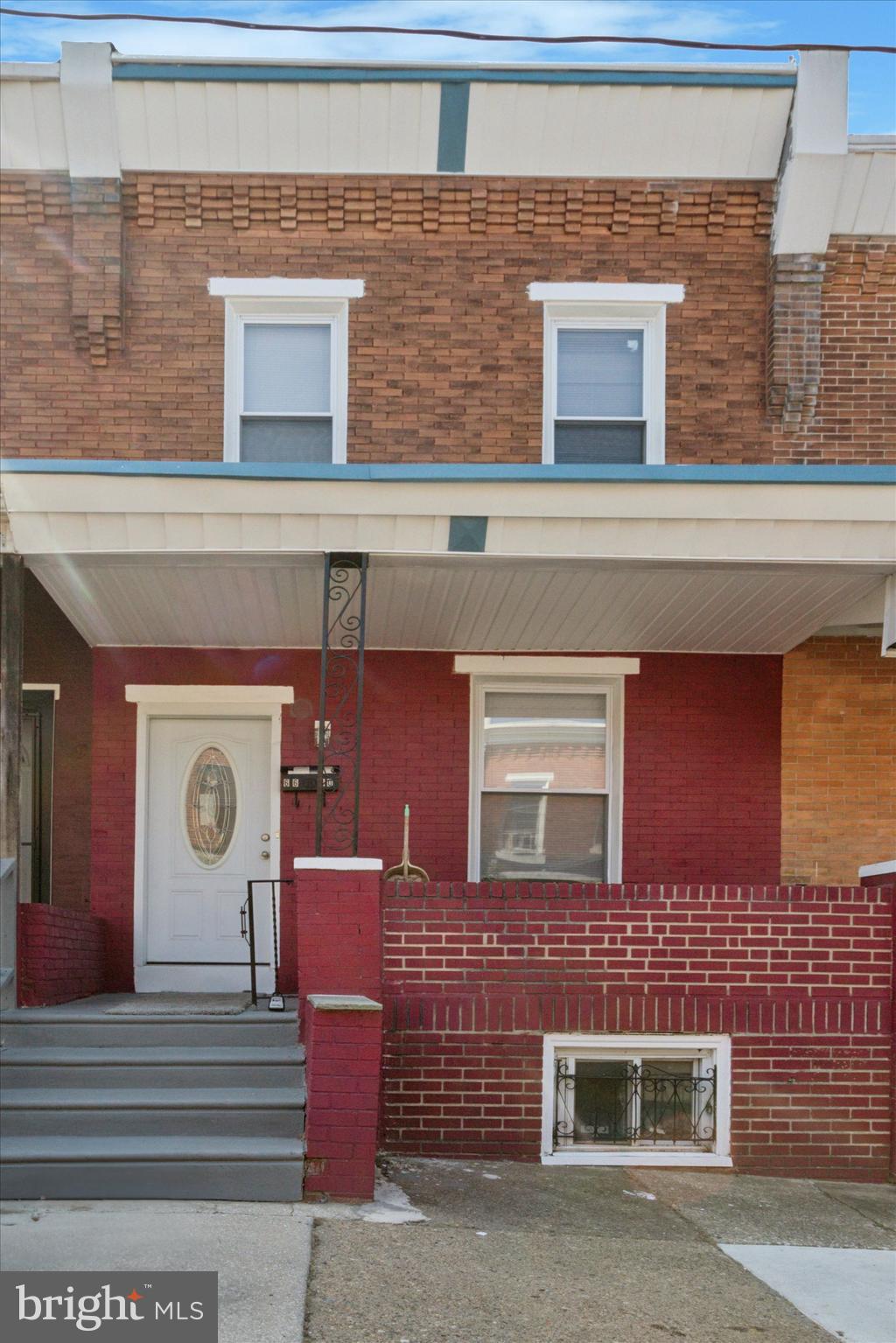 Now for sale in Overbrook Park! A 3-bedroom, 1-bathroom brick rowhome with newer roof, replacement windows, and updated kitchen and bath. This home would be perfect for an owner-occupant or as an investment property. The main level begins with a large open living/dining space that includes ceiling fans, recessed lighting, and a decorative fireplace. The updated kitchen features tiled backsplash, stainless appliances, and leaves room for a table or additional storage. Here, you'll also find access to a small patio. Upstairs, there are 3 carpeted bedrooms and bathroom with tub shower. A partially finished basement provides additional usable space or plentiful room for storage. Spend time outside with family and friends on the covered front porch! If you're home shopping in the neighborhood, be sure to schedule a showing!