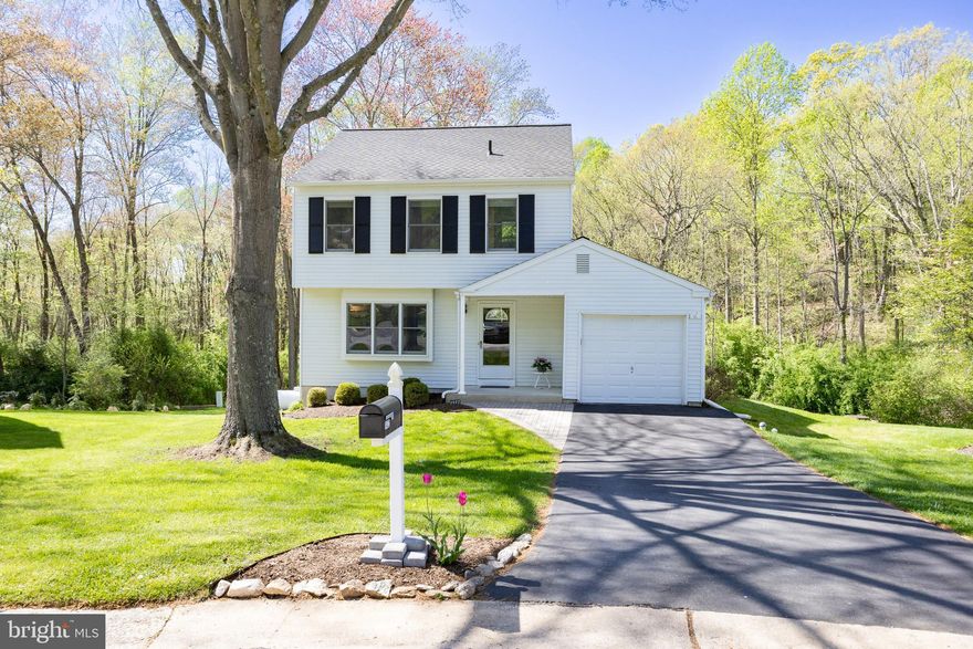 Welcome to one of the premier lots in Victoria Crossing! Tucked away at the end of a peaceful cul-de-sac, this 3-bedroom, 2.5-bath two-story home overlooks a tranquil stream and wooded backdrop, creating a picturesque setting. Step inside to a comfortable floorplan featuring a living room with brand-new carpeting and a beautifully updated custom kitchen complete with 42" wood cabinetry that extends to the ceiling, under cabinet lighting, Corian countertops, a tiled backsplash, and countertop seating. The adjacent dining area features a built-in desk unit and opens to a spacious family room addition with gas fireplace, ceiling fan, storage closet, and triple windows that bring in serene views of nature. A sliding glass door leads to the composite deck with vinyl railings, privacy panel, and stairs to the fabulous backyard—ideal for entertaining or relaxing in peaceful seclusion. The main level also includes an updated powder room with Corian vanity,  laundry room with cabinets, and access to the garage. Upstairs, you'll find a primary bedroom, en suite bath with updated shower, along with two additional bedrooms sharing a full hall bath with Bathfitter tub surround. All three bedrooms feature brand-new carpeting and ceiling fans for comfort. This home offers two basements: one finished space under the addition with radiant heat, a gas stove with blower and thermostat, storage closet, windows providing serene views, and sliding glass door to a private patio. This room is ideal for a home office, gym, or additional living area. The second basement is accessed off the kitchen and provides ample storage space and another sliding glass door to the patio. This home went through an independent energy audit and energy saving features were added. Additional updates include propane hvac system (2018), 500 gallon propane tank (owned), roof (2022), gas hot water heater (2019), 3 sliding glass doors, and deck. This popular neighborhood is within the Downingtown School District with STEM Academy and is conveniently located near United Sports Complex, Broad Run Park, Rt. 30 By-Pass, and train station. This home has been well-maintained and is truly a pleasure to show.