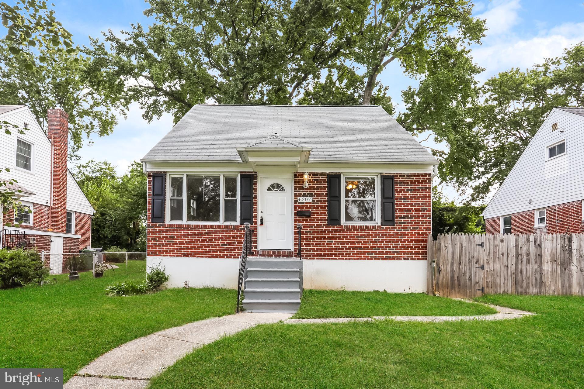 Welcome to 6207 Eastern Parkway — a charming brick Cape Cod offering timeless character and modern comforts. This 3-bedroom, 2-bathroom home boasts 1,726 square feet of light-filled living space. Inside, you’ll find original hardwood floors, fresh paint, and craftsman details like arched entryways and built-in shelving. The galley kitchen features a gas range and plenty of updated cabinetry. Two bedrooms are conveniently located on the main level, while the spacious primary suite with private bath occupies the upper level. A finished basement adds flexible space for work or play. Step outside to enjoy a private backyard, ideal for entertaining or relaxing. Located close to schools, parks, MedStar Hospital, and just a short drive to both Downtown Baltimore and Towson, this home is truly move-in ready with a neutral color palette and plenty of natural light throughout.
