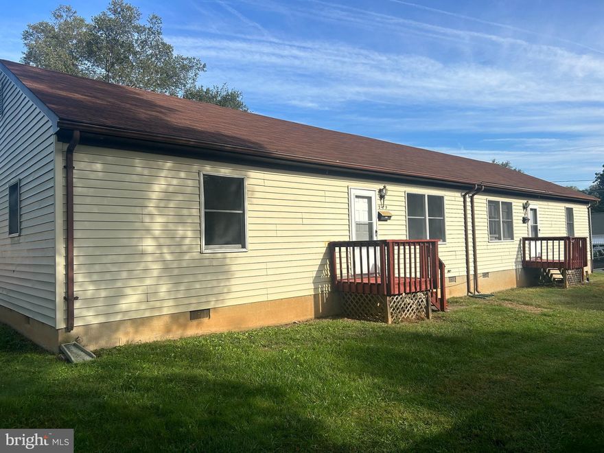 Great investment  property!! Duplex unit, each boasts 3 bedrooms and two bathrooms. Freshly painted interior with new carpet and lvp flooring, updated baths . Large yard  and ample parking. Roof replaced in 2016.  Outbuildings for added storage.  Short walk to downtown Berryville.