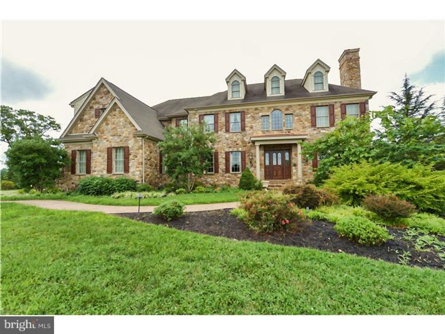A rare re-sale opportunity in the beautiful community of Parker Preserve. This classic Chester Co. fieldstone Colonial is situated at the end of a cul de sac with spectacular views on 1.44 acres. As with all the homes in this premier neighborhood, materials, workmanship and finish details are of the highest caliber. Enter through the custom 8-foot double doors shows that this home was made for entertaining. Living spaces are accommodating and welcoming, including: 2-story foyer with sweeping staircase, formal living and dining rooms, family room, library, sunroom, and a state-of-the-art custom kitchen with premium chef-grade appliances. Rich hardwood flooring, deep crown molding, 9' ceilings bring together the elegance and warmth of this home. The main suite is a true owner's retreat with luxurious bath, sitting room with built-in cabinetry and gas fireplace. Designed for relaxation and comfort, the lower level has a custom bar and offers entertainment/media/exercise rooms and a full bath. This gracious lower level is tiled, perfect to allow your summertime guests to enjoy the expansive outdoor pool area complete with a fire pit. This home will meet all your expectations with the premier setting and community and distinctive features.