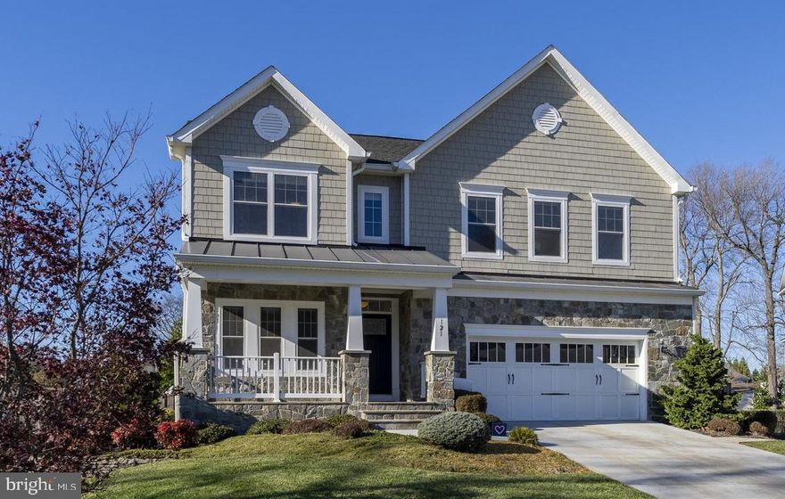 Stunning 2014 built craftsman home in sought after Vienna Woods. Amazing .27 acre lot sited on a quiet
cul-de-sac w/ front porch, fenced yard, screened-in porch & patio. Open floor plan with 5 bedrooms,  5 bathrooms & 4,670 square feet of finished living space across three levels. Great flow for entertaining with Acacia Cappuccino hardwood flooring, formal living/dining rooms, office, full bathroom,  spacious family room with stone fireplace, and gourmet kitchen! Upper level houses primary bedroom with tray ceiling, walk-in closet, and spa-like en suite bathroom. Three additional bedrooms, two full bathrooms, and laundry room located on the upper level. Lower level features recreation room, wet bar, fifth bedroom, full bathroom and walk-up access to the backyard. Outdoors you will find a screened in porch, stone patio, fully fenced in yard, and extra large garage! This home has an incredible location one block from the Town of Vienna, Vienna Elementary, and steps to downtown Vienna/Maple Ave shops, restaurants, Metro, and more!