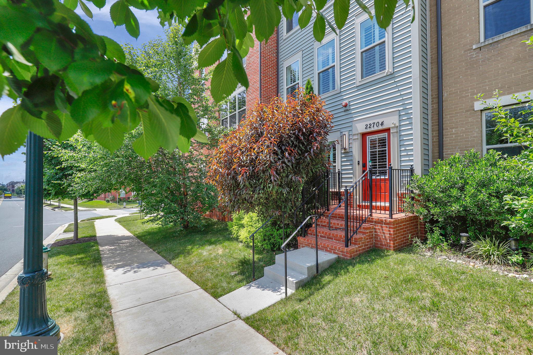 Welcome to this exceptional four-level former model home in the sought-after Cabin Branch neighborhood of Clarksburg, MD. Designed for modern living, this residence features engineered hardwood floors throughout, fresh Sherwin-Williams paint, and a bright, open floor plan that seamlessly connects the living spaces. The expansive, upgraded kitchen is a chef’s delight, boasting a massive island, granite countertops, upgraded stainless steel appliances, tile backsplash, recessed lighting, and a sink built into the island for added convenience. The kitchen seamlessly flows into a spacious family room and opens onto a large back deck, ideal for outdoor dining and entertaining.
Enjoy flexible living with a 1st-level bedroom ideal for guests or a home office, and take in scenic views from the front rooftop terrace overlooking a wooded conservancy. The home is equipped with dual-zone HVAC, a smart Samsung dual washer and dryer, energy-efficient plantation shutters on the first two levels, and blackout top-down honeycomb shades on the upper levels. The double-insulated garage door and energy-saving features make this home approximately 40% more efficient than standard energy-efficient homes and over 100% more efficient than an average home, according to the Potomac Edison Home Energy Report for this property.
Additional highlights include a rough-in for an optional half bath on the first floor, a two-car garage with double driveway parking, and access to community amenities such as covered pavilions, playgrounds, open fields, and scenic walking trails. Conveniently located near Clarksburg Premium Outlets, dining, parks, and with easy access to Route 270, this home offers the perfect blend of style, functionality, and energy efficiency in a vibrant community setting.
