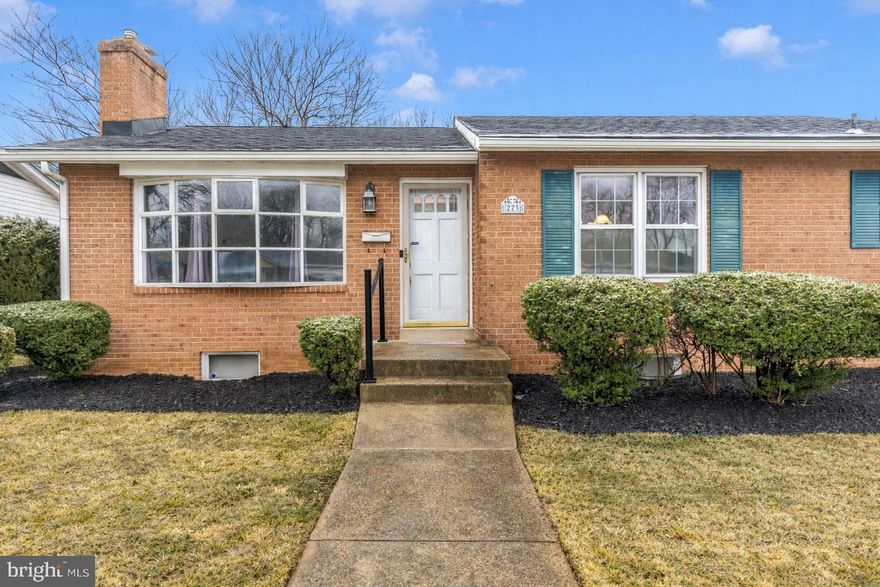 Brick rancher in a highly convenient Frederick location - just minutes to shopping, dining, and major commuter routes, while still offering a sense of privacy and space.  Inside, you’ll find a well-maintained home with room to make it your own over time. The living room centers around a classic brick fireplace with a crisp white mantel and built-ins, creating a warm, functional gathering space. A former carport has been converted into a spacious bedroom suite with a full bath and walk-in closet, offering flexibility for a primary suite, guest quarters, or a quiet work-from-home setup. (Buyer to verify use and improvements.) The mostly level yard provides usable outdoor space for relaxing, entertaining, or gardening, with a treehouse that conveys as-is for a bit of added character. The walk-up basement is partially finished and ready for your vision, ideal for additional living space, hobbies, or storage. Priced with updates in mind, this home presents a solid opportunity in an established location without overpaying for someone else’s renovations.