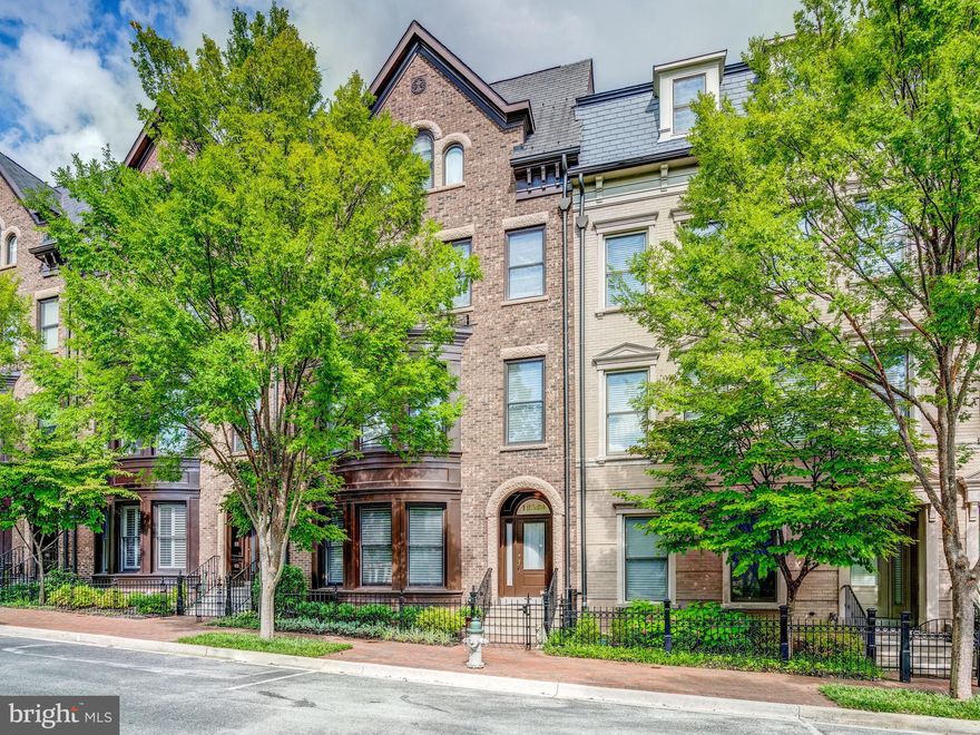 Welcome to 12523 Linda View Lane! This award-winning Berkeley model New York-style Brownstone home is situated perfectly on a quiet street across from the sparkling & refreshing community pool, with easy parking in one of the best locations within the fabulous Park Potomac community! Named "Community of the Year" by both the MAME and GALA Awards, this convenient and unique development offers a variety of pleasures for a refined yet comfortable lifestyle with amenities galore including an exquisite mix of dining establishments, trendy shops, Harris Teeter, hiking trails, playgrounds, and is close to major commuter routes, Country Clubs, and more! 
Impeccable design features with no detail overlooked-this gorgeous 5 Bedroom, 4.5 Bathroom, 26" wide townhome has over 4,300 square feet of spacious sun-kissed space on 4 fully finished levels with a private Elevator, ceilings that soar, recessed lighting, useful storage space, and custom built-ins throughout! Enter this extraordinary home to find a welcoming and elegant entry-level Foyer. The Home Office with quality built-in bookcases and cabinets is flooded with light from the bay window. This room can also be used as a 5th Bedroom. A spacious Media Room/Exercise Room, full Bathroom, storage closets, Elevator, and access to a large 2-car garage complete this level. 
Ascend the craftsman staircase to discover a Formal Living Room that does not disappoint, with walls of windows, graceful moldings, and modern lighting. The built-in Living Room cabinets with lighting and mirrored backing provide a great backdrop for decorative objects, plus convenient storage for dining room pads, and tablecloths. A formal Dining area is perfect for an impressive dinner party exuding the epitome of grace and elegance. The gourmet Kitchen will inspire awe with premium countertops, pull-out drawers, a Viking range, stainless steel appliances, ample cabinetry, a pantry, and a center island fit for a chef! The Kitchen opens to the luminous Family Room with a gas fireplace, wine bar with granite countertops, and walk out to the upgraded synthetic deck. Enjoy the peaceful summer breeze and morning sun while enjoying your morning cup of coffee. A powder room completes this generous level of wonderful living and entertaining space. 
Explore further to the 3rd Level where you meet a gracious Primary Suite with a fantastic closet room, custom-designed for this Suite. The Primary Bath offers a separate soaking tub and oversized shower. You will love having a top-of-the-line washer and dryer right outside your bedroom door in a spacious Laundry Room! Two additional Bedrooms and a Full Bath complete this level. 
The 4th Level is where the fun happens with plenty of space to enjoy time with friends & family! This Loft Space features a wet bar, mini-fridge, charming 4th Bedroom, and full Bathroom, making it also a great option for Guests/ Au-pair/ Nanny living. A double-sided Gas fireplace and walkout to the large rooftop deck invite the best in entertaining on any scale while feeling on top of the world! What an incredible opportunity to purchase a home in a desirable neighborhood with over $120,000.00 in builder upgrades and additional Home Improvements made by the current owners of another $145,000.00.......act fast, you don't want to miss this one!