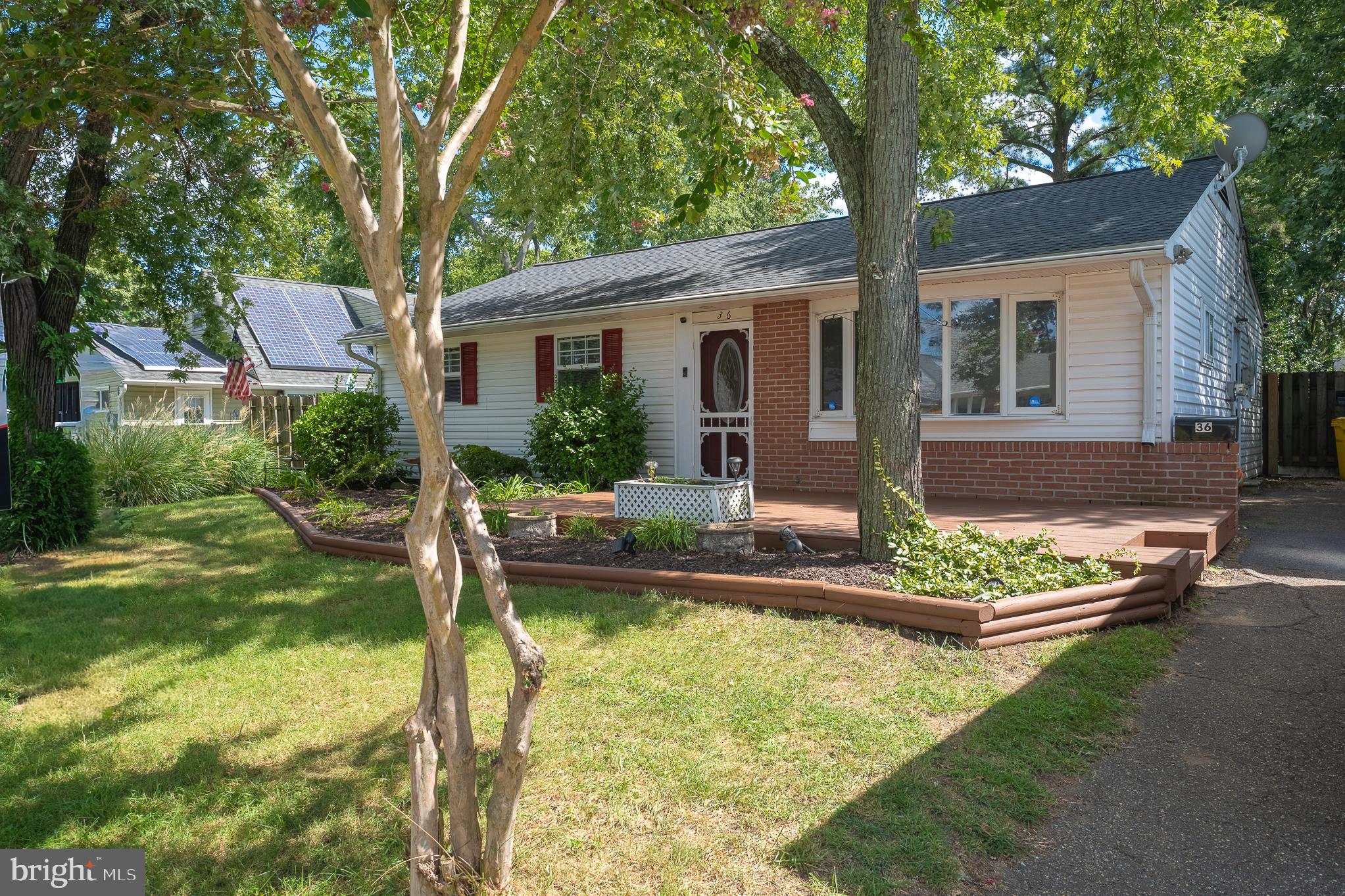 Big PRICE and INTEREST RATE IMPROVEMENTS! Take advantage of this attractive offering now priced to sell at well BELOW its $370,000 Appraised value! Welcome home to 36 Elm Drive in Country Club Estates! Enjoy easy one-level living in a charming brick rancher on a quiet street in this highly sought after water-oriented community. This comfortable 4 Bedroom + Den, 1 Bathroom home features large closets in every bedroom, built-ins throughout the house, a large sunny living / family room, separate dining area, with recently updated major features such as wood-grained Luxury Vinyl Plank throughout, fresh paint, vinyl siding, leaf-guard gutters, and a new roof, Central AC system and hot water heater - making this as-is offering a reliable choice! The beautiful Chef’s Kitchen features new stainless steel appliances with gas oven and cooktop, 42” wood cabinets and generous countertops. Step outside to a spacious privacy fenced backyard, paver patio and fire pit - all ideal for crab feasts, grilling, entertaining friends and quiet mornings with coffee – with plenty of room for the kids and pets to play! Two roomy storage sheds add convenience, and there is a wide double gate at the end of the driveway to pull your boat through and store safe and sound until your next water outing on nearby Marley Creek. There is easy access to the nearby community pool, marina, and recreation center. And there’s no HOA, but your family can enjoy all the amenities with an optional membership. Location, location , location – you’re a short hop to Sawmill Creek Park, Arundel Mills, Marley Station, Chesapeake Center, Glen Burnie shops, and minutes from Glen Burnie High, Marley Middle, and two nearby elementary schools. Commuters have it easy with quick access to I-95, I-97, Route 100, 295 and BWI. Welcome home to 36 Elm Drive in Country Club Estates!