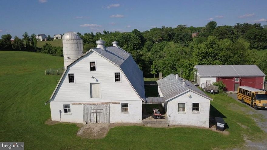 LARGE LAND WITH BEAUTIFUL LANDSCAPING PREVIOUSLY USED TO FEED COWS. WELL PUMP REPLACED  2022 AND SEPTIC TANK EMPTY 2022 PUBLIC WATER   RUNS INTO THE LAND BUT NOT CONNECTED 

 MORE INFO VISIT PARK ND PLANNING FOR MORE INFO.