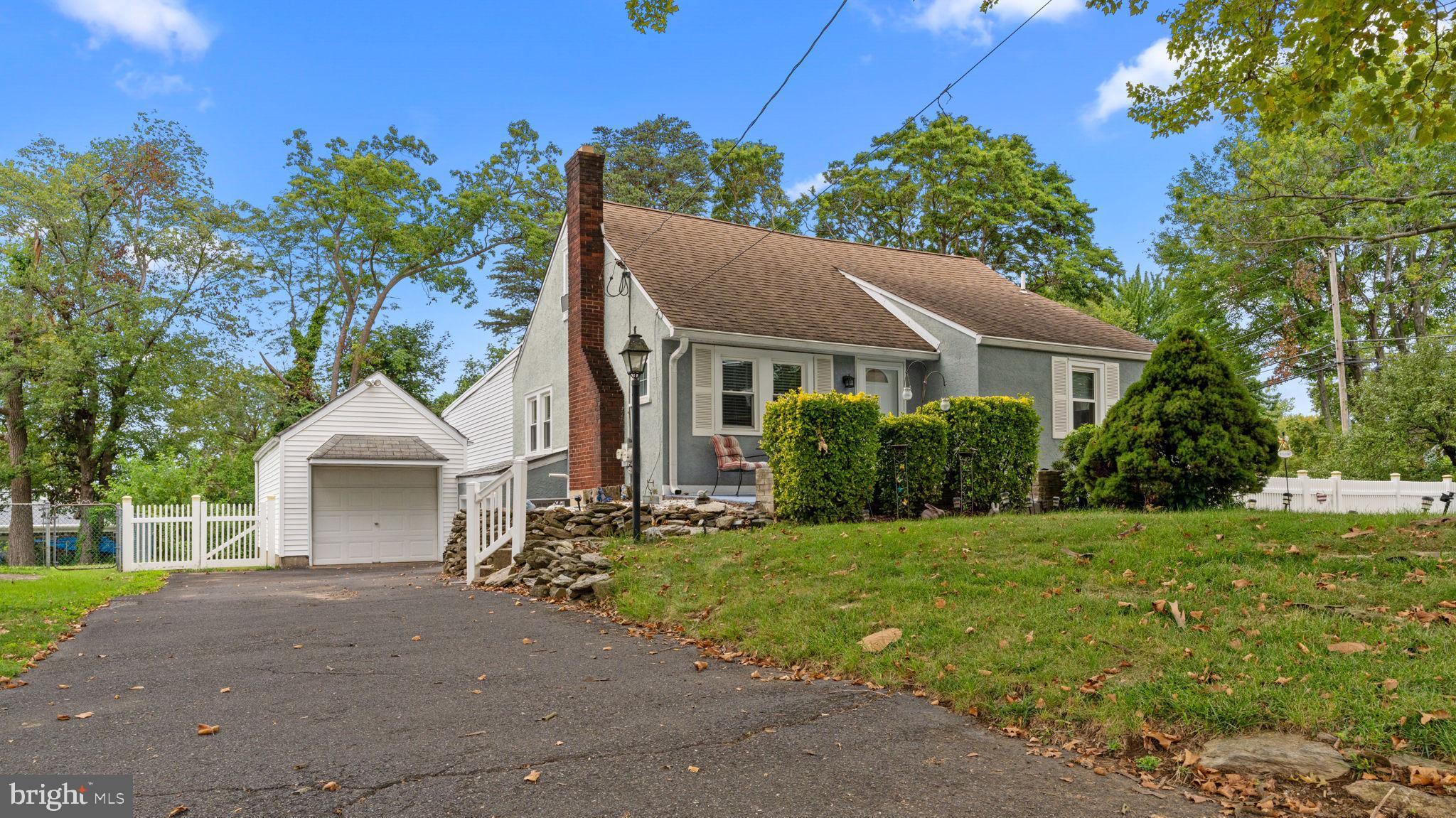 Welcome to this charming Cape Cod-style home that perfectly blends comfort, functionality, and classic character. Step inside to a warm and inviting main living room featuring a cozy fireplace. The spacious kitchen offers ample counter space and flows seamlessly into the dining area, creating the perfect layout for everyday living and entertaining. Just off the kitchen, the sun-filled family room addition boasts large windows that fill the space with natural light. From here, step out onto the covered deck overlooking the expansive fenced yard—ideal for gatherings, play, or simply enjoying the outdoors in privacy. The main level includes two bedrooms and a full bathroom, while the upstairs retreat offers an additional bedroom complete with its own full bathroom. For added convenience, the home features a basement with plenty of storage and a detached garage, providing space for both vehicles and hobbies. This lovely home offers both comfort and practicality—don’t miss your chance to make it yours! Showings will start at the Open house Friday August 22nd from 5-7pm.