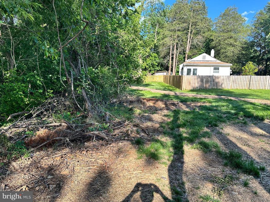 One of four lots that can be developed for single family homes!  The developer is responsible for installing road.  County will take over road upon completion.  Perfect opportunity for builder developer.  Public water and sewer run through future road.  See disclosures for  more information.  Bring offers!  No sign on property