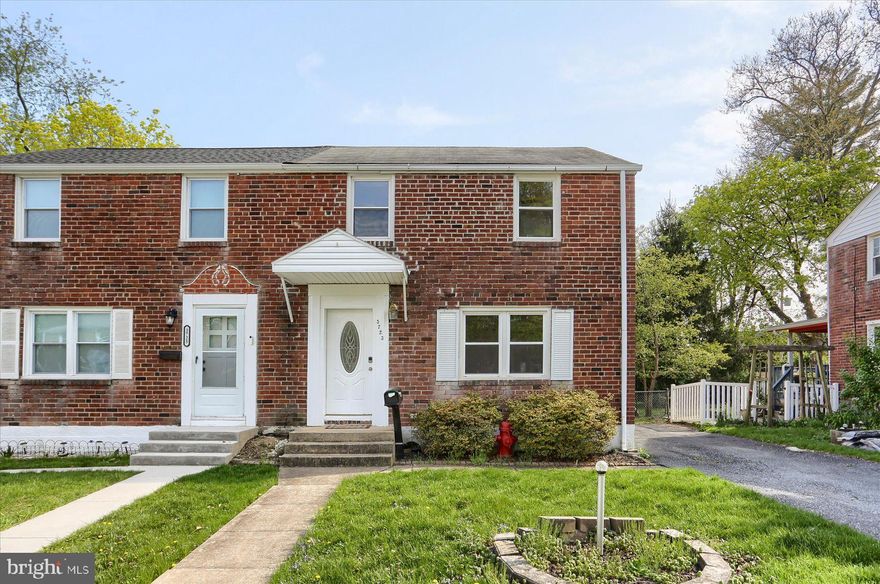 Step into the charm of this sturdy 1940's semi-detached all-brick home, an enduring classic that boasts timeless hardwood flooring throughout. Spacious sun-drenched living room. The kitchen has beautiful new appliances and seamlessly connects to the dining area. Upstairs, discover 3 bedrooms and full bath. Relax on the spacious covered porch overlooking the level fenced backyard offering ample space for outdoor activities and gatherings. Additional features include central A/C, efficient gas heat and easy access to major routes as well as proximity to a community park, playgrounds, and dining options. Ideal for those seeking both style and convenience without compromise. Schedule your showing today!
