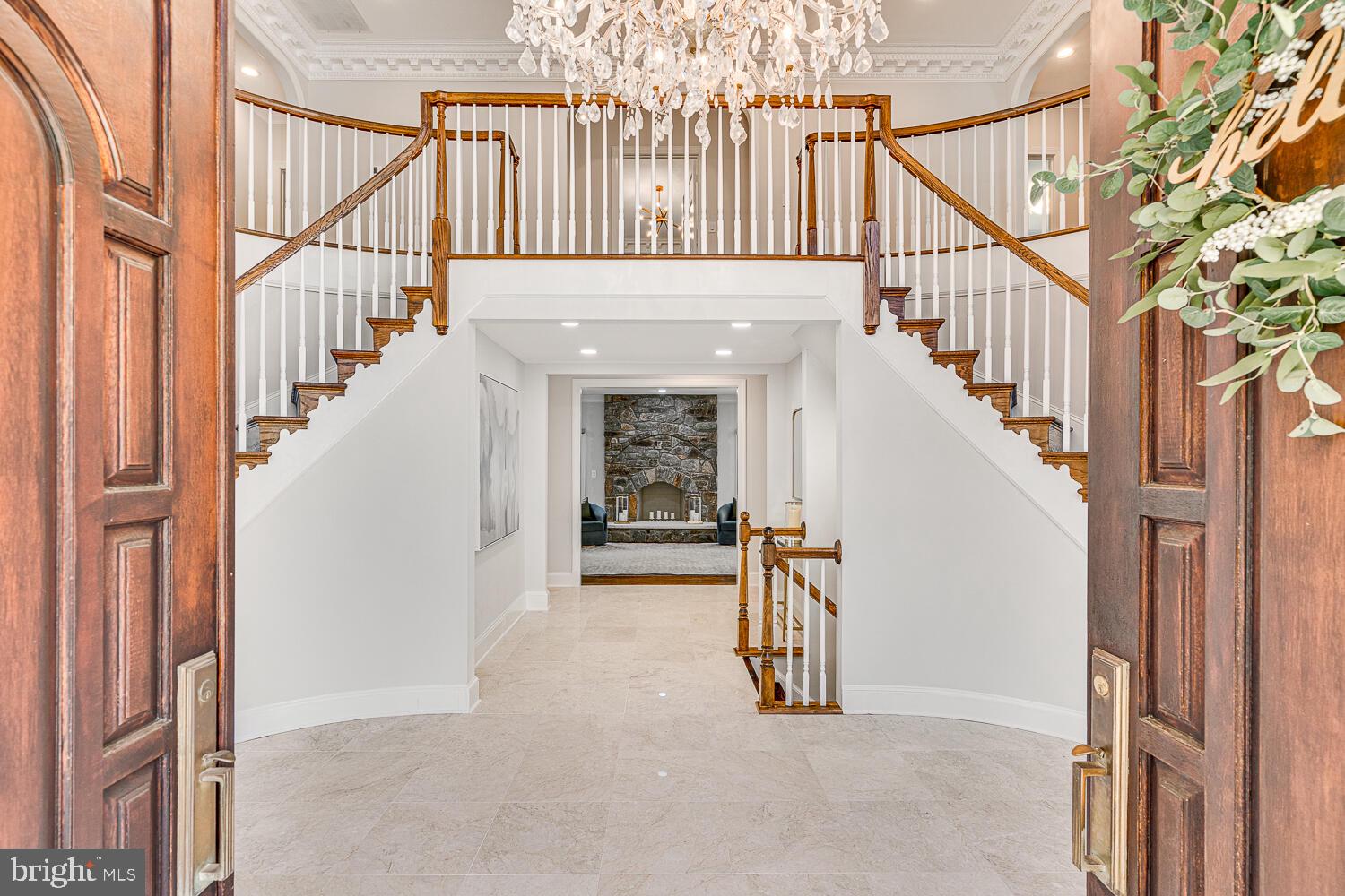 9118 Bells Mill Road: a modern manor of luxury, perfected. This private 8-bedroom, 7.5 bath estate sits behind a gated drive off Bells Mill Road in the heart of Potomac. A circular motor court and mature landscaping create a discreet, elegant approach to the all-brick residence. Don't miss the video tour!
Inside, a dramatic two-story foyer with dual staircases, marble floors, and a cascading chandelier sets the stage. Formal living and dining rooms lead to a mahogany-clad office, open family room with stone fireplace, and a reimagined gourmet kitchen with oversized island, beverage bar, and top-tier appliances. A main-level guest suite, mudroom, laundry, and 4-car garage add convenience.
Upstairs, the primary retreat offers a fireplace, dressing room, and spa bath with steam shower, sauna, and skylit freestanding tub. Three ensuite bedrooms complete the level. The above-ground lower level includes a great room with fireplace, guest suite, two additional bedrooms/dens, playroom, gym, laundry, and ample storage.
Sited on nearly an acre with a flat, pool-ready backyard, this 8-bedroom estate combines privacy and accessibility—just minutes to top schools, downtown Potomac, and world-class dining.
--
Key Updates:
Exterior painting (2025), Thermador dishwasher (2025), LG washer and dryer (2025), brick repointing (2025), gazebo (2024), grill gas hookup (2024), primary bedroom closet update (2024), sump pump replacement (2024), primary bathroom and upper level bathrooms all updated (2023), main floor laundry/mudroom update (2023), LG washer and dryer (2023), LVP flooring installed in basement (2022), main and lower level bathrooms updated (2022), hardwood floors refinished (2021), 2-zone HVAC (2020), high-end kitchen appliances (2020), complete kitchen update to create open concept living-dining (2020), surround sound theatre speakers installed in lower level great room surround sound installed (2020), grand foyer update and coat closet built (2020)