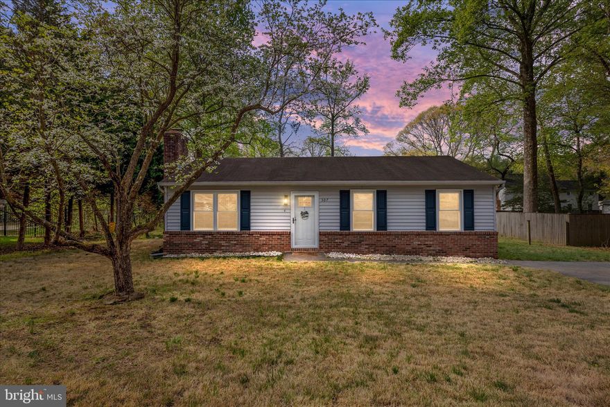 Beautifully updated 3-bedroom, 2-bath rancher offering easy one-level living in Riverdale Forest. This home features a bright and open living room with vaulted ceilings and a cozy wood-burning fireplace, perfect for relaxing or entertaining. The eat-in kitchen is a standout with white cabinetry, a large peninsula with seating, and plenty of space for everyday dining and gathering. Enjoy outdoor living with a spacious deck overlooking a fully fenced backyard, complete with a storage shed and set on nearly 1/3 acre. Ample off-street parking for up to 4 vehicles adds everyday convenience. A perfect blend of comfort, space, and functionality!