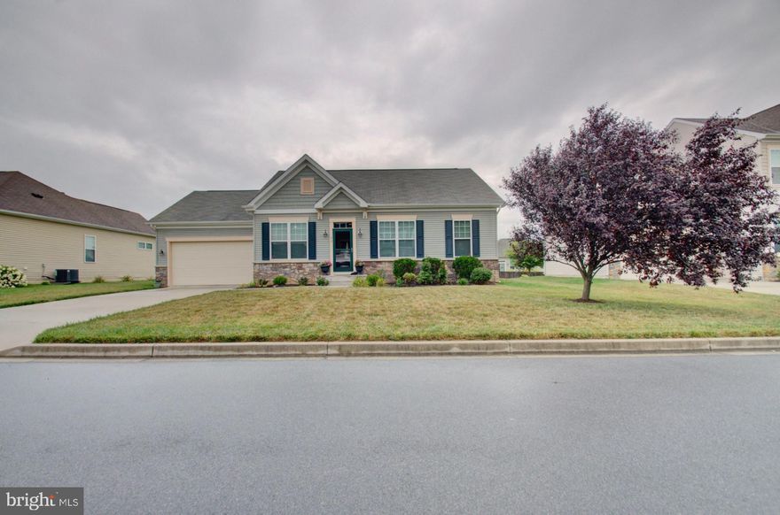 Pristine ranch home in the Arcadia Springs community. Open floor plan with hardwood floors throughout the main living area. Separate formal dining room.  Gourmet kitchen boasts stainless steel appliances , large island, and eat in area. Kitchen sliding door opens up to a beautiful Trex Deck which leads down to a bricked grilling area and a bricked sitting area. Great space for outdoor entertaining or gathering around the wood burning fireplace in the spacious living room. A guest bathroom and three bedrooms branch off from the living room so there's no need to use stairs. But if you need extra space for guests or visitors, head downstairs for a large family room which also has access to the outdoors. A bedroom and full bath on this lower level add versatility for where your family or guests may want to stay. Very large walk in closet. 
Lots of storage! Convenient commuter location, minutes to Route 9, I 81 and the VA State line. Also close to the VA Hospital and other medical facilities. Hike the Appalachian Trail and enjoy the many  parks nearby.