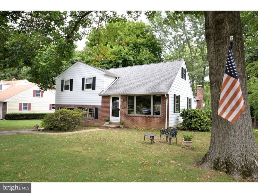 You can't help but think "this feels like home" when you walk through the front door into the warmth of the living room and elegance of the dining room. The rear of the home expands your living and entertaining space with a large family room you don't find often in Springfield Township! The extra space has a wall of windows facing the park-like backyard, as well as a fireplace with a full stone surround. The kitchen has a breakfast bar and oversees the open floor plan. The lower level offers even more living space, great for an office or recreation room and complete with a powder room and laundry room. Park your gear or vehicle in the attached garage. The upper levels offer three ample sized bedrooms and a full bathroom. Unfinished walk-up attic. Newer furnace, Central Air Conditioning, Electrical and roof. Lovely home in a sought after neighborhood in the coveted Springfield Township School District.