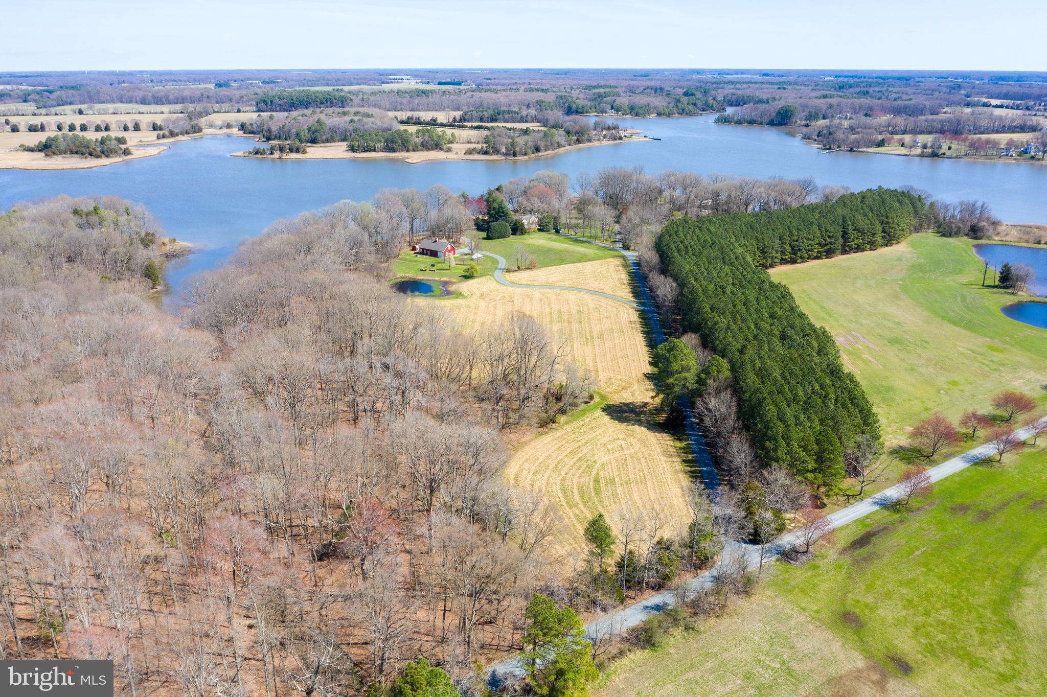 "Moot Point", a classic Kent County Waterfront Compound less than 10 miles from Chestertown, 15.77 acres with 1,166 feet of protected shoreline with 4' MLW on the East Fork of Langford Creek - 100' pier, 10,000 lb boat lift, and "jet ski/runabout" lift. 3 cottages comprising 4 bedrooms, 4.5 bathrooms with the primary cottage being a restored 1934 Hodgson House, which are recognized as the first true prefabricated homes constructed in the US. The recently constructed 2,760 sq.ft. barn/shop with 2 bays, 3 exterior overhead doors features heated concrete floors in all sections, central a/c in spacious workshop, wood stove, 1/2 bath, and mechanical room. New mound septic system and 20 KWH generator services all buildings on the property. DO NOT ENTER PROPERTY WITHOUT LISTING AGENT. NO SIGN POSTED.