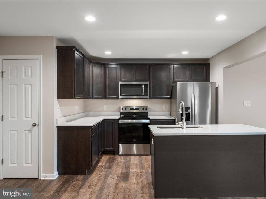 Brand new construction, filled with upgrades and amazing views!! Final two units, photos are of actual units, ready for a quick closing! This thoughtfully designed residence offers the perfect blend of style, comfort, and functionality, making it an ideal choice for those seeking modern living with all the amenities you desire. Key features include three bedrooms; each is adequately sized and bathed in natural light, creating a peaceful retreat for you and your loved ones. Two bathrooms are beautifully appointed, featuring contemporary fixtures and finishes, making your daily routine a breeze, plus a first floor powder room. With almost 1,600 square feet of living space, this home provides ample room to entertain guests or create your personal sanctuary. The main floor features a stunning, open-concept kitchen with sleek cabinetry, energy-efficient appliances, and a spacious island, making meal prep a joy. Ample parking space is available, including a garage and concrete driveway for your convenience. This home is ideally situated in a vibrant neighborhood with easy access to schools, parks, shopping, dining, and major transportation routes. This new construction semi-detached home perfectly blends modern design and functional living spaces on a spacious lot with dynamite views! With a commitment to quality craftsmanship and attention to detail, this home is the epitome of comfort and style. Don't miss this chance to make this exceptional home yours. Your dream home awaits!