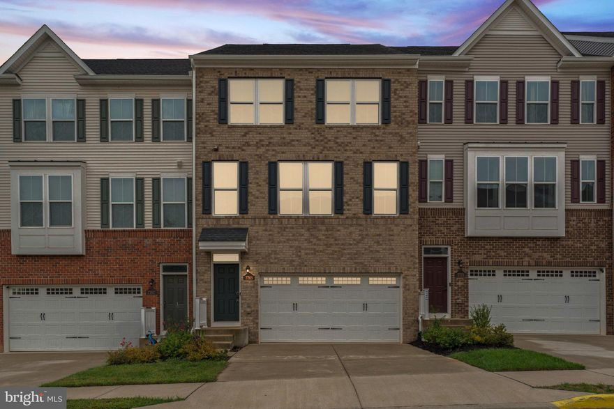 Welcome to your dream home in the Blackburn community. This exquisite, McPherson Grand townhome boasts 2,677 sq. ft. of living space, 4-bedrooms and 3.5 baths, and two-car front load garage!
 As you step inside, you will be greeted by hardwood floors complete with dry bar and wine refrigerator, and a first floor bedroom with full bath and oversized walk-in closet.

The middle level features a modern open concept with hardwood floors, 10’ center- island with quartz countertops and top-notch stainless-steel appliances, making the kitchen the heart of this home! The huge great room gives plenty of room for entertaining, while the large dining area can be used for more formal gatherings - whatever fits your lifestyle. 

Step outside to your private oasis – a covered porch with outdoor sky lanai fireplace and 18’x10’ composite rear deck, and fully fenced in backyard, perfect for entertaining or simply unwinding.
 Ascend to the upper level, where the primary ensuite beckons with a spacious luxury bath complete with Roman Shower, quartz countertops, and a generously sized walk-in closet. Two additional bedrooms share a stylish hall bathroom. The upper-level laundry room adds ease to daily living, with both washer and dryer.

This home is move-in ready and only 4 years young!  Residents of this community have access to a clubhouse with a gym, tot lots and a community pool. Convenient access to major transportation routes such as I-66 and Prince William County Pkwy.

Close to Old Town Manassas, the historic Manassas Battlefields, local breweries, various restaurants as well as entertainment such as Jiffy Lube Live.