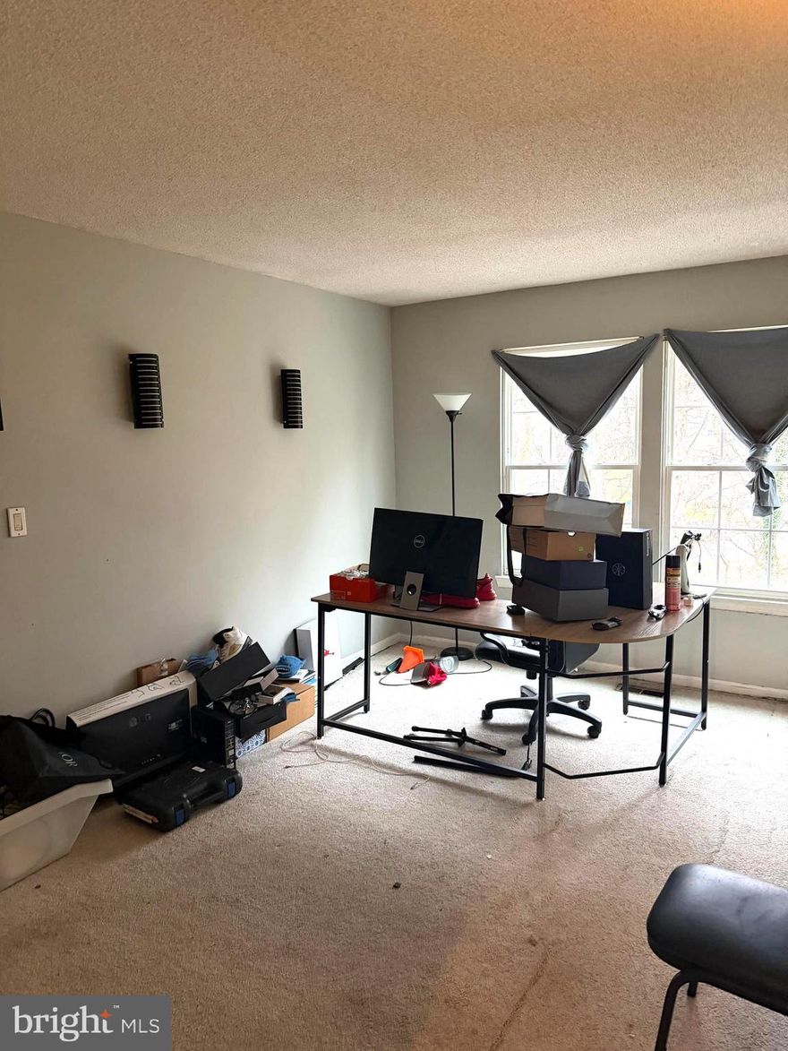 In  Laurel.... Spacious 4 BR Townhome.