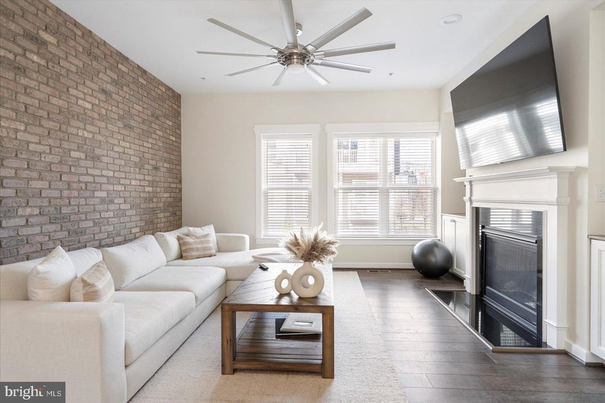 This stunning townhome boasts 3 bedrooms, 3 full baths, and 2 half baths, offering unparalleled luxury and attention to detail. Positioned facing a serene wooded area for maximum privacy, it promises a tranquil living experience. The main floor features a cozy family room with a gas fireplace and custom built-in shelving, seamlessly connected to the gourmet kitchen adorned with quartz counters and stainless-steel appliances. Step onto the fourth-level deck, upgraded with artificial turf and air tiles, offering a peaceful retreat amidst nature.

Every aspect of this home exudes quality, from the exquisite custom tile and flooring in all full baths to the upgraded lighting fixtures, ceiling fans, doors, trim package, and blinds. Additional storage is available in the one-car garage, ensuring ample space for your belongings. Nestled in the esteemed community of Admirals Square, residents can enjoy gatherings around the community firepit or explore nearby attractions such as Annapolis Town Center, Harbour Center, and the Festival at Riva, renowned for their shopping and dining options.

***If interested, furniture is available for purchase***

Conveniently located near commuting routes 50 and I-97, as well as just a short Uber ride away from downtown Annapolis nightlife, this home offers the perfect blend of comfort, convenience, and luxury living. Don't miss out on this exceptional opportunity. Interior photos coming soon!