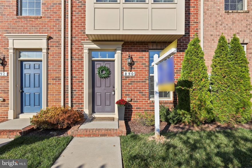 OPEN HOUSE CANCELLED - HOME IS UNDER CONTRACT - Welcome to 890 S Macon Street, located within the coveted O'Donnell Square community! Enjoy a bright and spacious floor plan throughout your home, and leave your parking woes behind with the attached garage and extra space on the parking pad. The first floor offers a half bath and a wonderful room for a home office, additional living space, home gym, or man cave! The main level features an open floor plan with a gorgeous, gourmet kitchen, spacious living room with bump-out, and plantation shutters. Enjoy the extended deck for even more outdoor entertaining possibilities! The third floor boasts a beautiful primary bedroom with tray ceiling and en suite bathroom with upgraded tile, plus another room, full hall bathroom, and laundry! With the added fourth floor bedroom and full bathroom, this home offers plenty of space for work and play. As if all of that weren't enough, this home overlooks the beautiful common space! It gives the feel of a nice and open park view out front, and has terrific city views from the deck out back! This newer build townhome is also in a very convenient location close to the Shops at Canton Crossing, Merritt Gym, and I-95/I-895. You are also a quick drive or leisurely walk over to Canton Waterfront Park and the many dining options of O'Donnell Square. Don't miss out on seeing this beauty in person - schedule your tour today!