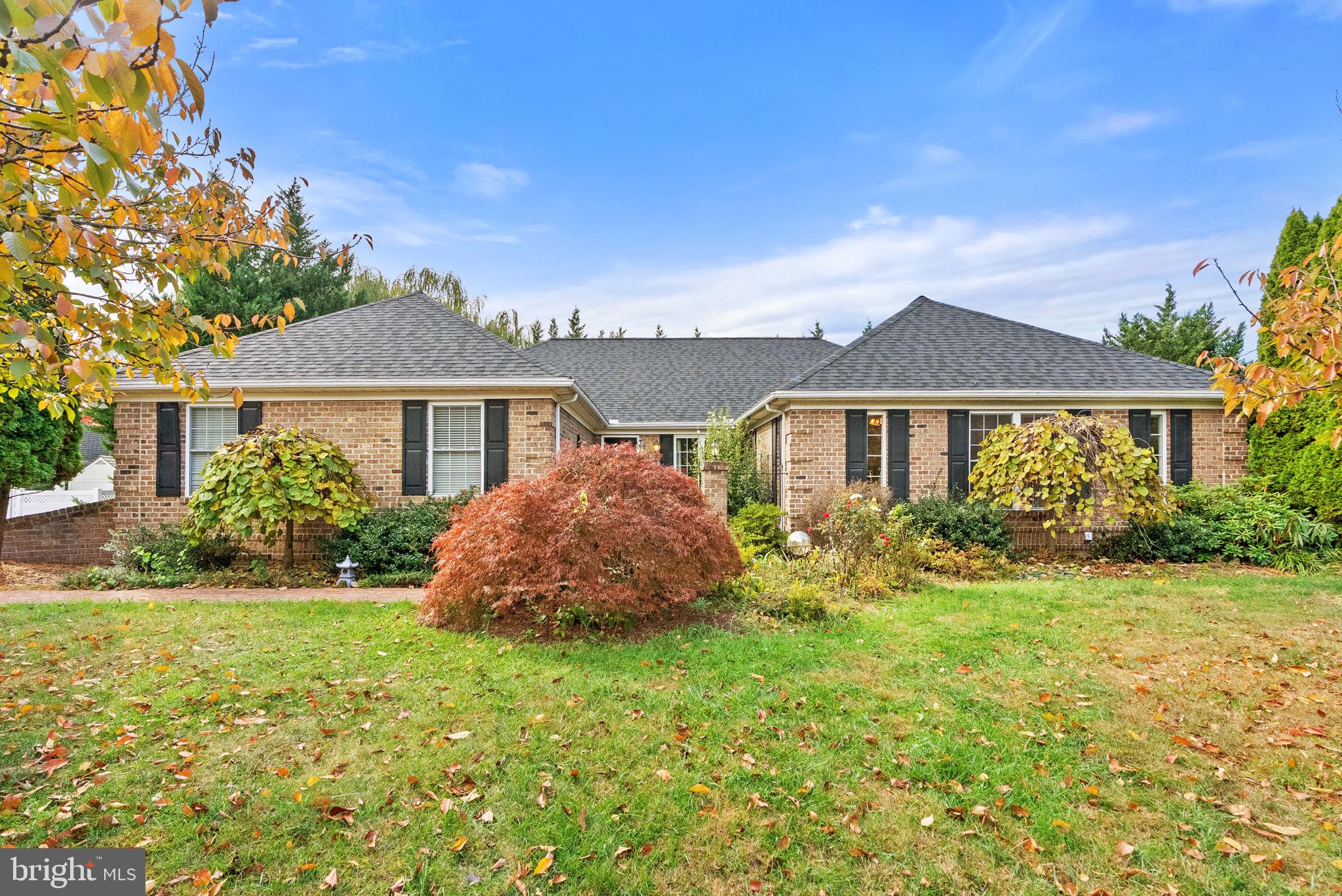 Welcome to 212 Fairfield Drive, a sprawling, all-brick rancher offering an incredible amount of space and comfort in a highly sought-after Winchester location. This home is a commuter's dream, providing easy access to I-81 and other major commuter routes all while offering a peaceful, private retreat. The main level is designed for both entertaining and daily living, featuring a formal dining room and a formal living room perfect for hosting. The heart of the home is a huge family room that boasts a cozy gas fireplace, dramatic vaulted ceilings, and skylights that fill the space with natural light. The eat-in kitchen is a chef's delight, offering an abundance of cabinets and counter space, a convenient built-in desk, and direct access to the rear deck. Also on the main level is a bright sunroom enclosed by a captivating wall of windows for year-round relaxation. The private areas include a generously sized primary bedroom featuring tray ceilings, walk-in closet and ensuite primary bath, plus two other spacious bedrooms conveniently connected by a large Jack-and-Jill bathroom. The finished basement dramatically expands your living space, featuring a fantastic recreation room, 2 bedrooms and a full bath, multiple bonus spaces perfect for a home gym or office, a dedicated storage room, and walkout access to the covered patio. Outside, you can enjoy the expansive rear deck, overlooking a beautifully private yard with mature trees and lush landscaping, along with a separate storage shed. Practical features include a two-car attached garage and a prime east-side location that is just minutes from Shenandoah University and Winchester Medical Center, and is close to the Apple Blossom Mall and countless shops and restaurants. Updates include, updated HVAC, a brand-new roof, new sliding glass doors and more. Don't miss the chance to own this fantastic property that truly has it all—size, location, and luxury!