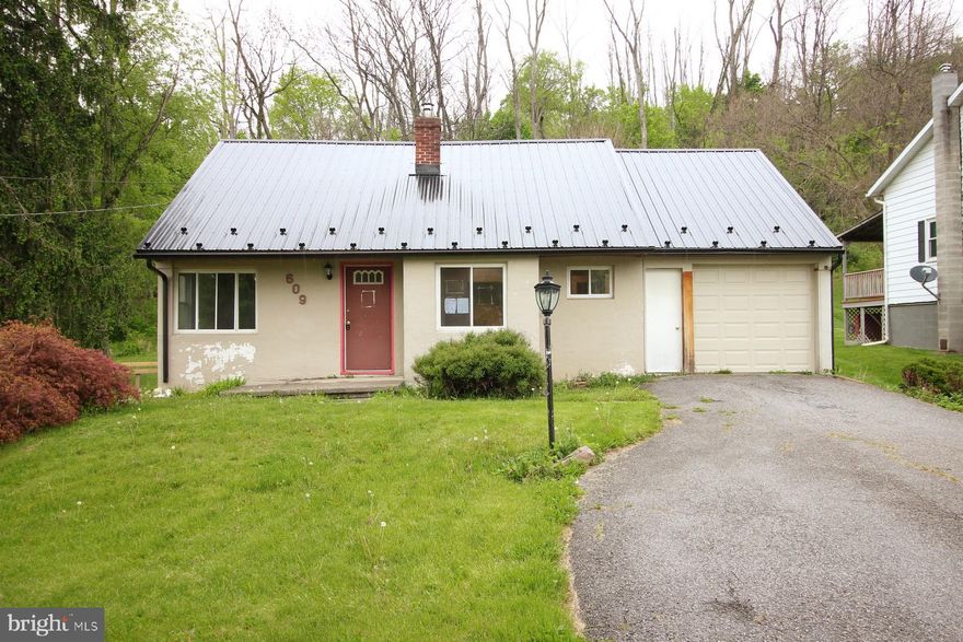 Recently updated prior to its 2023 sale, this 3-bedroom home offers a great opportunity with many improvements already completed. The layout includes one bedroom on the first floor and two additional bedrooms on the upper level. Full bathrooms with shower stalls are located on both levels for added convenience.  With some TLC and refreshing, the property has the potential to truly shine once again.  The garage features overhead doors at both the front and rear, offering added accessibility and flexibility for storage, workshop space, or vehicle access. Refer to Property Condition Report and Property Disclosure and Repair Information in HudHomeStore.gov for potential disclosure items. All bids submitted at HudHomeStore.gov. Case #446-575021. Additional fees may apply. Buyer pays full transfer tax & for Deed Prep. Being offered "AS-IS" with no warranties expressed or implied. Property is FHA 203(B) IE (Insured Escrow) and FHA 203K eligible subject to an FHA Appraisal. Additional Information, Notices on Lead-Based Paint and Radon Gas, as well as Buyer Incentive Opportunities, electronic bidding and earnest money procedures can be found at hudhomestore.gov.