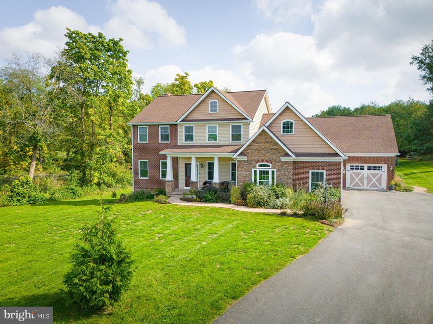 Welcome to your dream home nestled on a lush 2.26-acre lot, where elegance meets practicality in Washington Boro, PA. This exclusive 5 Bedroom, 4 1/2 bath , 3 car garage , first floor laundry, 11-year-old, custom-built marvel boasts 3,271 square feet of living space, complemented by an additional 1,638 square feet in a fully finished, daylight basement that screams, "Home theater or craft room? Why not both?"

Step inside to find a primary bedroom suite on the first floor that treats relaxation like royalty; HIS and HERS walk-in closets, HIS and HERS vanities, custom walk-in shower, and a jacuzzi tub are just the start. The expansive, custom kitchen serves up granite countertops, a center island with a cooktop, and every chef's dream layout. Need a snack while you cook? The mini refrigerator within arm's reach has got your back!

Don't worry, the wonders don't end there! The living room, with its 20-foot ceilings and cozy, stone, wood burning fireplace, offers stunning backyard views and an invitation to unwind. Need more space? A staircase secluded behind the mudroom unveils in-law quarters/bonus room complete with its own living area and bathroom.

Outdoor living is just as grand, with a large stone patio featuring a fire pit—an ideal spot for s'mores under the stars—and a wraparound deck made for Sunday brunches.

All high end building materials throughout
Extremely economical,  geothermal heating and air conditioning system.

Moments from Penn Manor Senior High School, John Herr's Village Market, and the picturesque Turkey Hill Overlook Trail, convenience is just a stone's throw away.

Don't just buy a house, own a lifestyle!