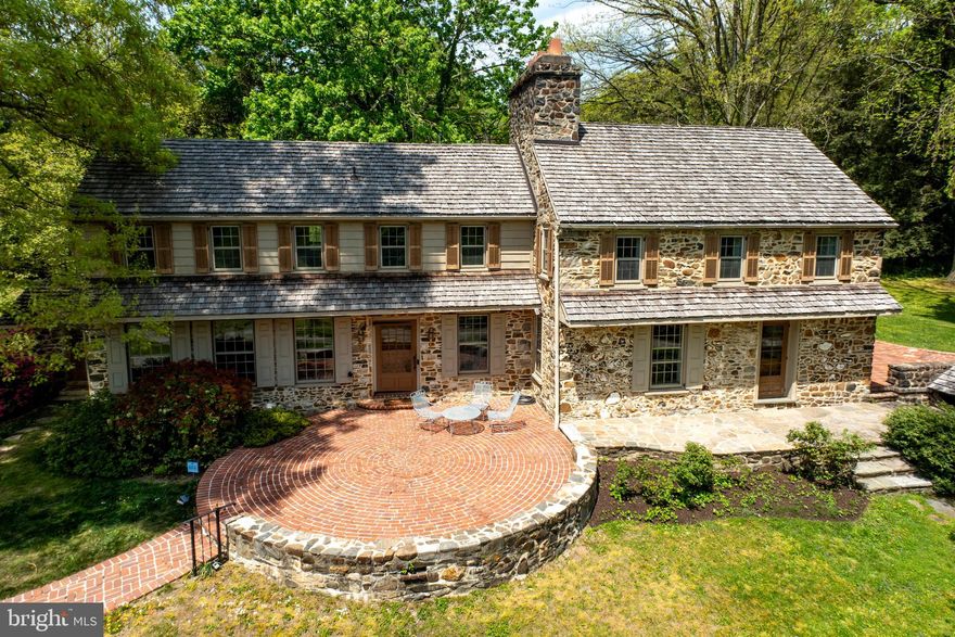 New price and ready for a new owner!!!  A beautiful stone colonial farmhouse on a large property in the Brandywine Valley, this home is one of a limited number of offerings of its kind.   Located within one of the most scenic areas in Chester County, it also provides quick access to West Chester, Downingtown, Exton, Philadelphia and Wilmington, Delaware.

The lovely stone house features a gorgeous circular brick entrance patio, pointed stone, and original hardwood floors throughout. Meticulous effort was made to restore the home in the traditional style - right up to the colonial Williamsburg paint colors. Custom wainscoting, chair rails and cabinetry with period hardware all add to its charm and unique beauty. There are four fireplaces and the largest is a charming walk-in hearth from the home’s 1760 origin.

A beautiful original barn adds to the appeal, with a tack room and grooming area, four stalls and open area, and covered sheds for multiple additional horses or other animals. The barn was completely re-roofed in 2022 with traditional cedar shakes.  Other buildings include a three-car garage and a lovely original stone springhouse at the property’s entrance.

The home's other amenities include two riding rings, a picturesque woodland lake (bring your fishing poles!) and two streams providing water to each of the three main pastures. Within the property are many riding trails with equestrian jumps. 

Sunset views over rolling pastures complete the experience of living in this amazing home. It's ready for those who love horses and nature – and want to be in a beautiful location in the country with easy access to shopping, dining, and cultural attractions.