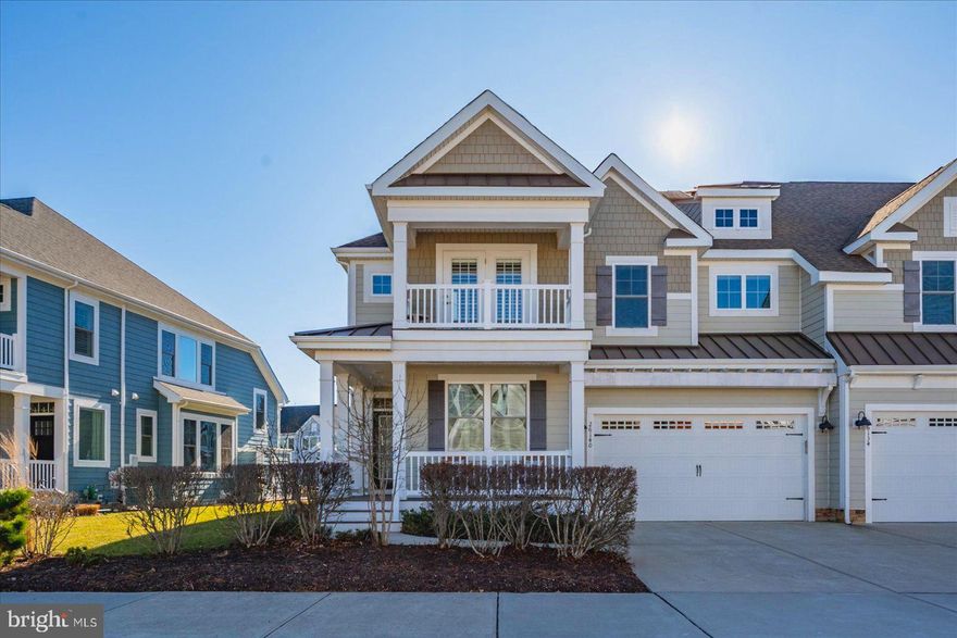 Beautiful Schell Hatteras model backing to a serene pond, ideally located in the Eastpoint neighborhood just a short walk to 38 Degrees and The Point. This 3-bedroom, 2.5-bath home offers open-concept first-floor living. The gourmet kitchen features Bosch stainless steel appliances, quartz countertops, and a large island, flowing seamlessly into the dining and living areas with a fireplace and direct access to the expansive custom paver patio. Perfect for entertaining, the patio includes a built-in grill and a remote-controlled SunSetter awning. Premium hardwood floors run throughout the main level, which also includes a private office, a conveniently located laundry room, and a spacious first-floor primary suite with two custom walk-in closets and a large en-suite bath. Upstairs, a welcoming loft features a wet bar with custom cabinetry and a beverage cooler, along with two guest bedrooms—one with a balcony—and a full bath. A 16’ x 16’ unfinished room offers potential for an additional bedroom and bath. The two-car garage provides ample storage and space for all of one’s beach needs. Located in award-winning Bayside, just miles to the beach, with amenities including golf, pools, fitness center, tennis, pickleball, clubhouse, Freeman Arts Pavilion, kayaking and much much more!