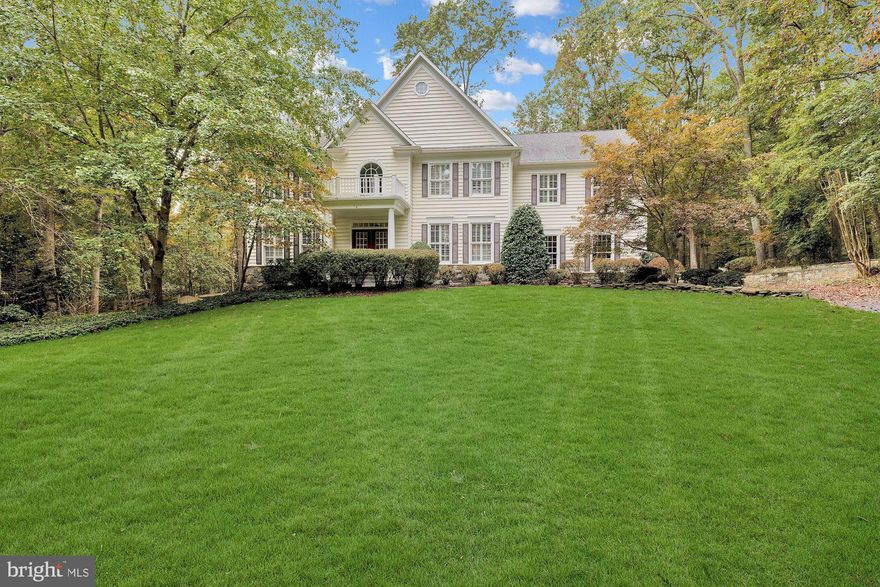 Sited at the end of a cul-de-sac, this updated home offers a private and verdant setting on over an acre in close-in Great Falls. The open and light-filled layout with lots of storage features a living room with a gas fireplace and custom built-ins, study with oak built-ins and formal dining room with a butler's pantry connecting to the gourmet kitchen. Offering granite countertops, a center island and a breakfast nook, it opens to the light-filled two-story family room with a large stone fireplace and a wall of windows overlooking the rear deck and backyard. A powder room and laundry room/mudroom with access to the attached three-car garage complete this level. Upstairs, there is an expansive primary bedroom suite providing a sitting room with a gas fireplace, a balcony overlooking the backyard, dual walk-in closets and a spacious primary bath. There is a second bedroom suite, as well as two additional bedrooms that share a Jack and Jill bathroom. The lower level offers a flexible, open layout that features a large recreation room with built-ins, a wood-burning fireplace that could be easily converted to gas and a game area. Additionally, there is a bedroom, exercise room/bonus room, full bath and a large storage room. The backyard is a fantastic retreat with a large deck with a gas hookup for a grill and a sizable backyard. Close to Great Falls Village, as well as convenient to both Tysons and Reston.