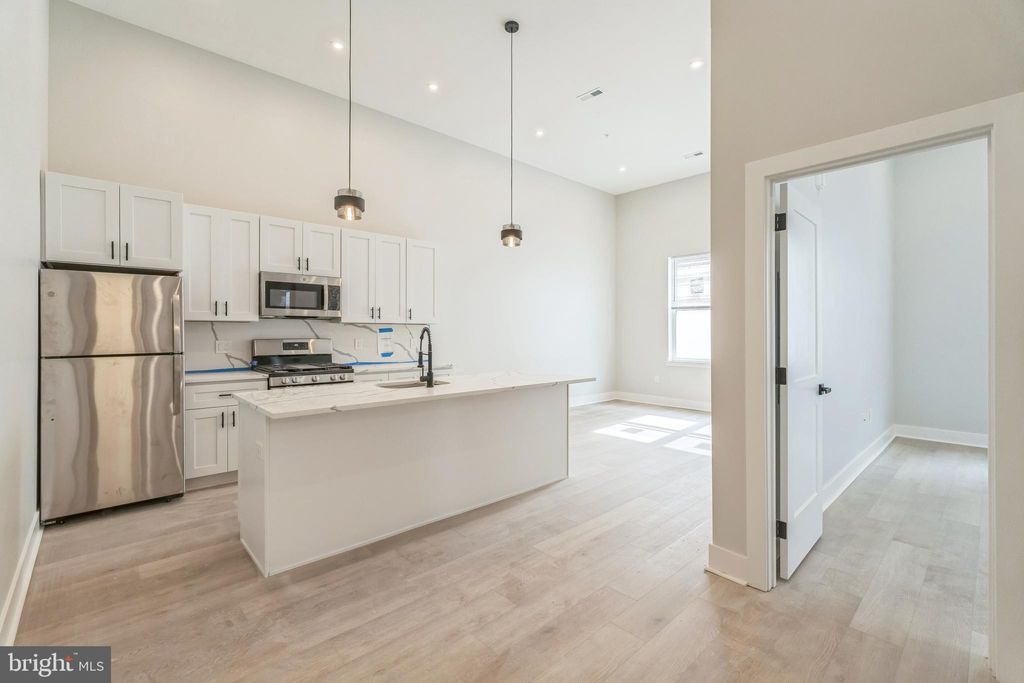 Photo of 1243 N 26th Street #A, PHILADELPHIA, PA 19121 (MLS # PAPH2576826)