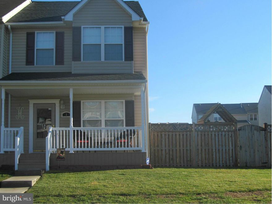 This 3 bedroom 2 1/2 bath end of group has all the bells and whistles! nothing too be done just move right in! Enjoy the large fenced yard. Front Porch is a wonderful addition, Rear deck with pool. Ten foot addition on rear. Hardwood Floors, Granite Counter tops, new siding, roof and much more! Master bath and  nursery off master bedroom. Fully finished basement w/ separate playroom.