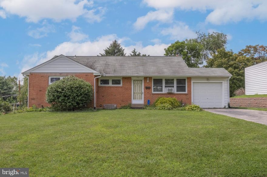 Welcome to the 3 bedrooms, 2 full bathrooms ranch conveniently located in Paoli. Walk through the front door to the nice living room with coat closet. Just behind this room is the nice size dining room with ceiling fan and windows looking out to the beautiful flat back yard. Next to this room find a kitchen with lots of counter space, builtin microwave and ceiling fan.  A laundry area with utility sink finish this area. There is a door to the back yard which is great for gatherings, There is also a door to the unfinished basement, with plenty  of storage, To the left of the living room you will find a hall with two closets (one a linen closet).  There are also 3 nice size bedrooms with hardwood floors. The master suite has his/her closets and and its ensuite bathroom with tile flooring.  The hall bath has tile flooring and tile backsplash in the shower/tub. The garage is great for storage or parking .  1 Year Home Warranty included.  Call to see today