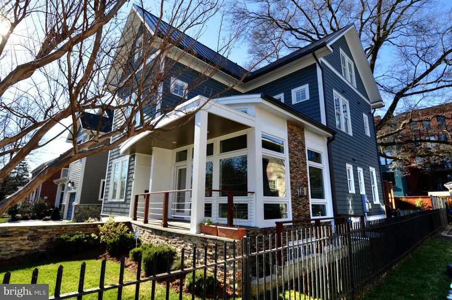 PRICE ADJUSTMENT - do not miss this amazing value! Extraordinary custom home just a few blocks to Metro & Clarendon shopping & dining.  Better than new 5/6 BR, 4.5 BA Green home with walnut floors, honed marble, chef's kitchen (Subzero, Wolf, Bosch), 2-car garage, generator, solar panels, yard.  Energy Star qualified/LEED Certified. Elem school choice Key or Arl Science Focus. OPEN HOUSE 4/17 2-4.