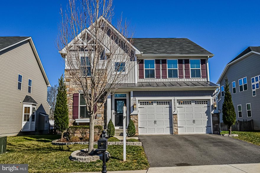 Back on the market!  Buyer fell out.  Their loss is your gain!    Gorgeous floor plan backs to fenced pond and open area.  Gourmet kitchen with lots of granite counter and cabinet space.  Family Room off Kitchen.  Sun Room extension off Kitchen allows for eat in area leading to large rear Deck.   Perfect for entertaining!   Master Suite with over-sized Walk In Closet and open Master Bath.  Finished basement with Theater Room and bump out extension.  Walk up rear to yard.   Its ready for you to move right in!  Welcome Home!