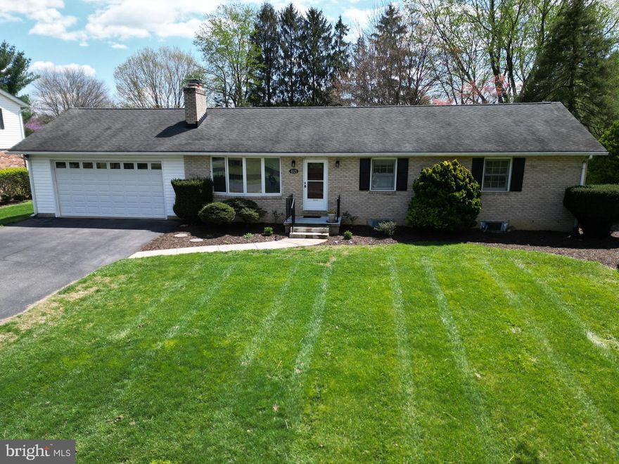 Fabulous opportunity to purchase this amazing brick rancher with a huge sunroom on a premium lot in Clover Hill, Frederick's premier neighborhood. This three-bedroom Ausherman rancher features a spacious living room with brick hearth fireplace, custom bay-bow window, ceiling fan and hardwood floors, an updated kitchen with recessed lights & large pantry, and a separate formal dining room with gleaming hardwood floors.  There is a spacious primary bedroom with ceiling fan, hardwoods under the carpet, and a private ensuite bath, plus two additional bedrooms, each with hardwood floors and ceiling fans. Rounding out the main level is a second full hallway bath, and a huge private sunroom with stunning views of the amazing backyard.  The finished walkup lower level features a large family room with a second brick-hearth fireplace & custom built-in cabinets, new carpet and a rough-in for a wet bar.  Also downstairs is a den/office with new carpet and a 3rd full bathroom, plus a big unfinished utility/storage room.  There's also a huge two-car attached garage with pull-down attic stairs and service door rear exit.    The backyard features a large deck, mature landscaping, a convenient storage shed, a walkway from the sunroom to the garage, and lots of room to play. The community is amazing, and features a 13-acre private park with a pool, clubhouse, baseball diamonds, basketball court, tot lots, walking trails, picnic pavilion, and more. This location is close to downtown Frederick, Fort Detrick, and FCC and is easily accessible to all main commuting routes. This property is not in the HOA, although it’s possible to join and take advantage of the twice-weekly trash service, yard waste recycling, bulk trash pickups, and pool membership. The location is fabulous and is outside Frederick City, so there’s NO CITY TAX!  The roof is approximately 10 years old and the furnace & mini split were replaced in 2023.  This amazing home has been freshly painted and is in move-in condition.  Hurry!