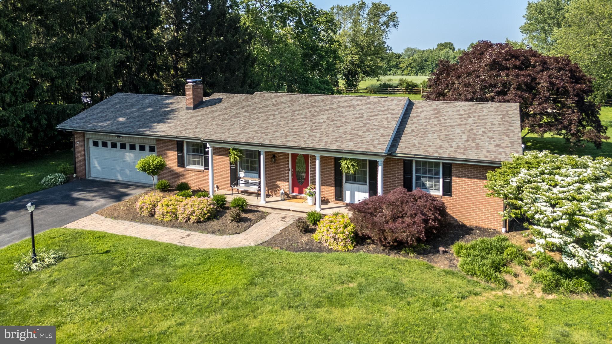 Welcome to 31 Longview Road, a beautifully maintained ranch-style home in the charming area of Hilltown Perkasie, PA. This inviting property offers three comfortable bedrooms and two renovated bathrooms, creating a perfect space for relaxation and everyday living.
Step inside to discover the charm from hardwood floors that flow seamlessly throughout the living areas. The living room is a cozy retreat featuring a gas fireplace(which can be converted back to wood burning. The view from the dining room through its elegant French doors, leads to a private patio, an ideal spot for hosting gatherings or enjoying quiet moments outdoors.
The kitchen is a bright delight, boasting stainless steel appliances, granite counters and a convenient eat-in area for casual dining. Laundry on main floor. Adjacent, you'll find a versatile sunroom that can be used as a family room, home office or den, equipped with a separate heating unit for comfort throughout the seasons with its walls of windows bringing the outside indoors.
Situated on a generous 1.14-acre lot, the property features a newer split rail with wire fenced yard and a covered front porch, providing plenty of space for outdoor activities and leisure. The full waterproofed basement, offering additional storage or potential for a workshop. The attached two car garage is well lighted and has plenty of extra room. Some noted updates to kitchen, bathrooms, HVAC with ecobee thermostat, hot water heater and electric panel.
This home is more than just a place to live; it's a haven of comfort and privacy for your property, conveniently located near local amenities and commuting routes. Experience the perfect balance of tranquility and accessibility here at 31 Longview Road.