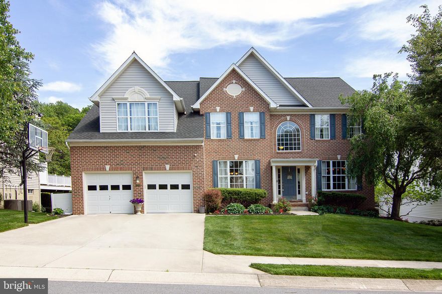 *open house canceled! *PRICE IMPROVEMENT** AN ENTERTAINER'S DREAM HOME! Are you looking for that dream home with all the creature comforts you can imagine? It just hit the market! A 7-seat theater room with a huge screen and then extra TV's for Sunday Red Zone football. A full wet bar in the basement with all the bells and whistles to entertain your fun friends. A humongous deck with a built-in grill (with granite countertop)! And that is just to start! Welcome home to this incredible 6 bedroom, 4 full bath, and one half bath house featuring almost 6000 square feet of finished living space! Situated on a cul-de-sac and backing to woods, the location is second to none! Walk inside to the beautiful open 2-story foyer and the hardwood floors throughout the whole first floor.  The massive open-concept kitchen was fully remodeled just 5 years ago. It boasts granite counters, an island, stainless steel appliances, a gas stove with oven, a second wall oven and microwave, a coffee station, a pantry, and bar space for stools! It is stunning! There is also a huge eat-in area beyond the bar/counter and this all opens to the massive family room. The family room is highlighted by the gas fireplace, lots of natural light, floating shelves and built-in shelving for all your games, quilts, etc... The main floor also has a large home office for all the folks who work from home. There is also a formal dining area, a sitting area, and a mudroom off the garage that has your washer and dryer, along with cubbies for the kid's coats, shoes, and book bags. Head upstairs to find 5 very sizable bedrooms! The primary bedroom is huge and features a sitting area, walk-in closet along with a second closet, and an en-suite bathroom. This bathroom has a soaking tub, separate shower, dual vanities, and linen closet. Bedrooms 2 and 3 share a Jack and Jill bathroom with dual vanities, and bedrooms 4 & 5 (with new carpet)also share a different Jack and Jill bathroom (with new LVP planking) ! There is room for everyone and plenty of baths to go around!  But the best is yet to come! The basement is an oasis of fun and entertainment you dream about. The main recreation room is huge and features a full wet bar with tons of cabinet space, convection oven/microwave, dishwasher, and under-counter lighting. There is an extra bump out where the pool table goes, a full bath, and then a separate 6th bedroom! You don't need 6 bedrooms? Use it as an exercise room, craft room, kids area...whatever you can think of! Then there is the theater room! Featuring 7 Barcalounger style chairs with stadium seating, this theater "screams" family movie night and Sunday football! A main screen and 2 "extra " TV's, along with surround sound, and it is an entertainment dream! If it is a beautiful day, you will want to hang out on your massive back porch which runs the length of the whole house! There is a permanent outside grill, a space for sitting and chatting, and a whole other space for dining! You will host every barbecue and family gathering! If you get some rain...just use the electric awning to cover part of the deck!  Backing to the woods, the idyllic setting makes this the perfect outside sanctuary. Only minutes from Piney Run Park and downtown Sykesville which was voted "The Coolest Small Town in America"!  And the Eldersburg schools are amazing! Check out the ratings! Some recent updates: Architectural shingle roof (2021). hardwood floors going upstairs and into the primary bedroom (2024), hardwoods in the living room (2021), HVAC in the basement (2024).