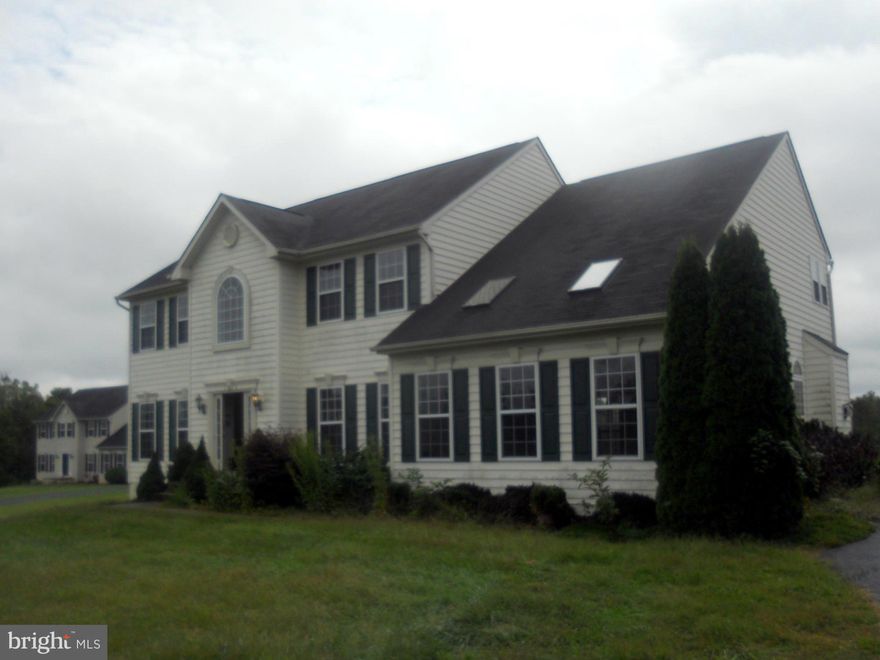 This large Sequoia with converted garage and detached 2 car garage with space for workshop has lots of potential.  Home sits on a culdesac lot in the back of Meadow Brook with great views.  Location is convenient to NVA and MD or the MARC train.  Huge kitchen, office on 1st floor, jack and jill bath upstairs.  No government financing or conventional would require rehab loan or cash.