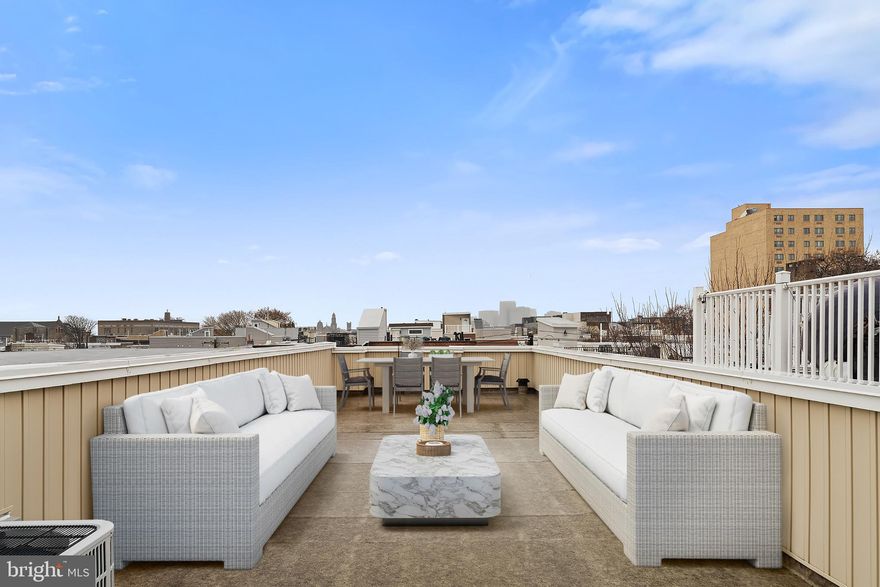 Experience contemporary city living in this 4-bedroom, 3.5-bath townhome in the heart of Graduate Hospital, offering approximately 3,000 square feet across four levels. The home features four private outdoor spaces, including a  roof deck with skyline views, and the option of a leased parking space included for two years with an acceptable offer.
The main level offers an open-concept layout with high ceilings, abundant natural light, built-in surround sound, and a gourmet kitchen. No detail was overlooked, with stainless steel appliances, granite countertops, a large island with seating, and a built-in beverage refrigerator. The dining area opens to a landscaped rear patio with a custom wood trellis.
The second floor includes an ensuite bedroom, two additional bedrooms (one with access to a large deck), a hall bath, and laundry. The entire third floor is dedicated to the primary suite, featuring a walk-in closet, spa-like bath with jetted tub, glass shower, double vanity, and a private deck just off the wet bar. 
Additional highlights include a finished lower level with flexible living space, dual-zone HVAC, reverse osmosis water filtration, whole-house surround sound, and a roof replaced in 2023.
Located just minutes from South Street West, the PHS Pop-Up Garden, Avenue of the Arts, and Rittenhouse Square, with dining, shopping, and transit nearby. Reach out to schedule a private tour!