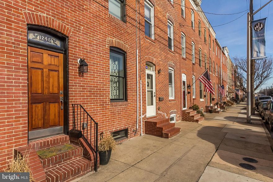 WELL HELLO GORGEOUS!  LOOK NO FURTHER FOR CHARM, CHARM, CHARM. 3 FULL FLRS OF FINISHED LVG W/ OPEN CONCEPT, WD FLRS, EXP BRK, CUSTOM KIT, 2ND FLR W/AMAZING MSTR BR & BA, ANOTHER BR W/ARCHITECTURAL BEAMS, FULL HALL BA W/CUSTOM BARN DOOR, 3RD FLR FAM RM (COULD BE 3RD BR) W/ RECLAIMED WOOD WET BAR, FULL BA, FRENCH DRS TO 2 TIERED ROOF DECK & PARKING! 6 YEARS REMAINING ON TRANSFERABLE CHAP  CREDIT!