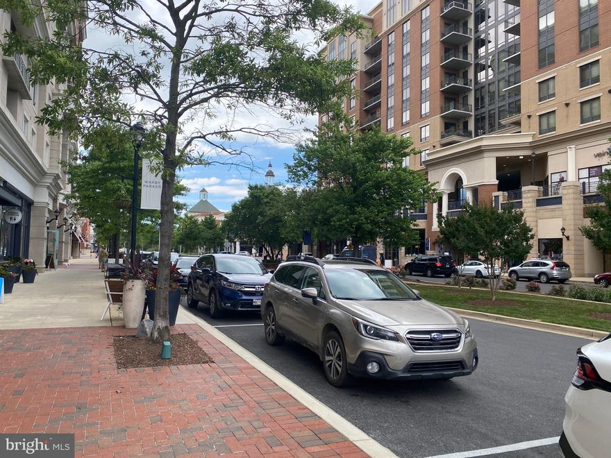 Fantastic 2 Bedroom condo with great views of Annapolis Towne Centre from the balcony with loads of upgrades throughout!
Discover the pinnacle of urban living in this beautiful 2 bedroom condo! This exquisite unit features high end finishes – including hardwood floors, brand new appliances, new HVAC system, plus a new washer and dryer. Unit also comes with two garage parking spaces and a storage unit.
Reap the benefits of having exclusive access to the rooftop terrace from your floor and enjoy all the luxurious amenities this building has to offer, with a state of the art fitness center and a rooftop pool. The rooftop pool area features an outdoor kitchen and lounge area with panoramic views of the Annapolis skyline ideal for entertaining!!! Nestled in the heart of a vibrant shopping district and a neighborhood filled with boutiques, fine dining, and charming coffee shops, convenient to all the major highways making it an effortless commute to DC or Baltimore. This unit shows well and is the epitome of fine living for anyone seeking a serene urban retreat that is steps away from shopping, great restaurants, and weekly summer entertainment.
This gem won’t last long and the Seller is offering $3,000 in Closing assistance!!! Contact us today and book your private showing don’t hesitate to make this your new home!