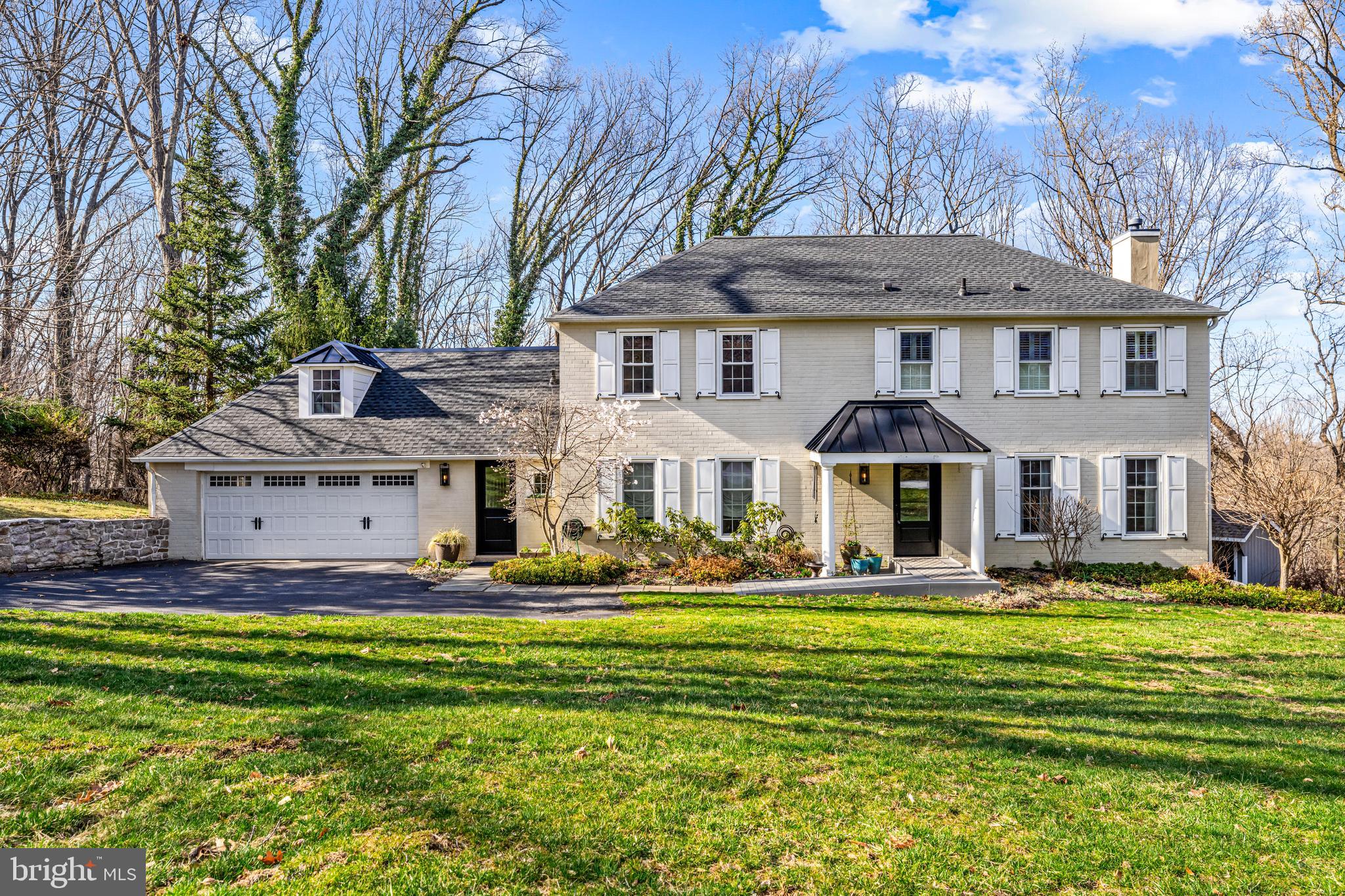 DEADLINE FOR OFFERS- 5PM ON SUNDAY 3/30
Showings will be cut off at 3PM tomorrow. Thanks to all for the incredible response!!
Welcome to 15 Patriot Circle, a beautiful and expansive residence nestled on a tranquil cul-de-sac in the highly desirable Shand Tract neighborhood of Devon. This exceptional home, offering 5 to 6 bedrooms and 4.5 baths, masterfully blends modern sophistication with timeless charm, creating the perfect balance of comfort and elegance. Thoughtfully designed with spacious interiors and custom finishes, this home is an ideal retreat for both everyday living and entertaining. It has been fully updated with recent upgrades which include a new roof, whole house A/C system and water heater-all replaced in 2024. A whole house generator is also an incredible benefit of this home.
Upon entry, you are greeted by sunlit living spaces adorned with gleaming, newly refinished hardwood floors and large windows that bathe the rooms in natural light. The heart of the home is the gourmet kitchen, featuring custom cabinetry, high-end appliances, soapstone countertops, wine refrigerator and a generous island—perfect for casual meals or gathering with friends and family. The kitchen contains a large seating area, perfect for casual conversation or games, or easily adapted for 'eat in' space. There is also a convenient cubby area and powder room as you enter from the attached garage, as well as a 'command center' with a large picture window for organizational space. The living and dining areas adjacent to the kitchen offer a seamless flow. The living room features a bluestone slate fireplace, custom millwork and coffered ceiling. From the living room through the privacy of pocket doors is a multi purpose room with large windows that afford expansive views of the wooded grounds outside as well as patio access through french doors. Shown as an executive office, this room could also provide an additional bedroom for in-laws or an individual with a disability, as there is an elevator in the room which brings you to the finished lower level.
Step outside from the kitchen or office to discover a private Trex deck which provides the perfect setting for outdoor dining and relaxing with friends and family. Down a set of stairs from the deck is a firepit area with sitting wall for stargazing and otherwise enjoying the peace and beauty of the surroundings.
Upstairs, the expansive primary suite is a private sanctuary, complete with a spacious walk-in closet and multiple built in closets and shelving. The spa-like en-suite bath features a custom made marble topped double vanity, a glass-enclosed marble shower and a deep soaking tub. Also on this level, you’ll find three additional well-appointed bedrooms , one with an ensuite bath. Additionally, there is the convenience of an upstairs laundry room combined with office or homework space—a super practical space!
The lower level presents a unique opportunity to provide an au pair or in-law suite. This area includes a large recreation room with built in cabinetry, a bedroom, accessible full bath, workout room and French doors provide a private side yard entrance/exit creating an extremely versatile living space. The elevator to the main level provides accessibility if and where necessary.
The cul de sac is the true center of the action in this special part of the neighborhood. It is where all gather to catch up with each other, or watch children on bikes and scooters or taking shots on the shared circle basketball hoop! It is a lucky buyer who will score this incredibly special home.
Situated within the award-winning Tredyffrin-Easttown School District, you are just minutes from the charm of downtown Wayne, the prestigious Devon Horse Show Grounds, and major commuter routes including Route 30, I-76, and Route 202. The Shand Tract neighborhood is known for its sense of community, with seasonal events and activities that make it one of the most sought-after locations in Devon.
