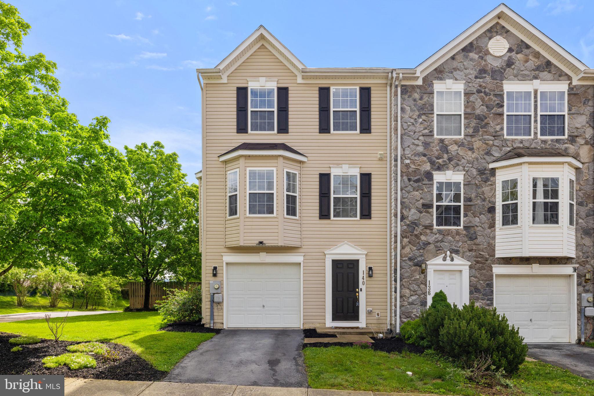 This beautifully maintained end-unit townhouse sits on a desirable corner lot, offering extra privacy, natural light, and a more spacious outdoor feel—all while delivering comfort, style, and flexible living options.
The entry-level is thoughtfully designed with a one-car garage offering interior access, a full bathroom for added convenience, and a dedicated office or flex space tucked away from the main living areas. Whether you’re working from home, tackling creative projects, or simply seeking a quiet retreat, this space offers privacy and functionality. A sliding glass door leads to your fully fenced backyard, featuring an 11x11 brick paver patio—ideal for relaxing, entertaining, or enjoying the benefits of your extra corner lot space.
Upstairs, the main level boasts two bumpouts that enhance the open feel. You’ll find a spacious living room, a well-equipped eat-in kitchen with a center island, stainless steel appliances, and a cozy sitting area off the kitchen. A charming chair rail adds character to the dining space, perfect for casual meals or gatherings.
The upper level includes a serene primary suite with a walk-in closet and an en-suite bath featuring a soaking tub and separate shower. Two additional bedrooms and a full hall bath complete the level, offering comfort and flexibility.
With added privacy, enhanced natural light, and the bonus of a corner lot, this end-unit townhome is ready to support the lifestyle you want—whether that’s relaxing at home, hosting friends, or working in peace.