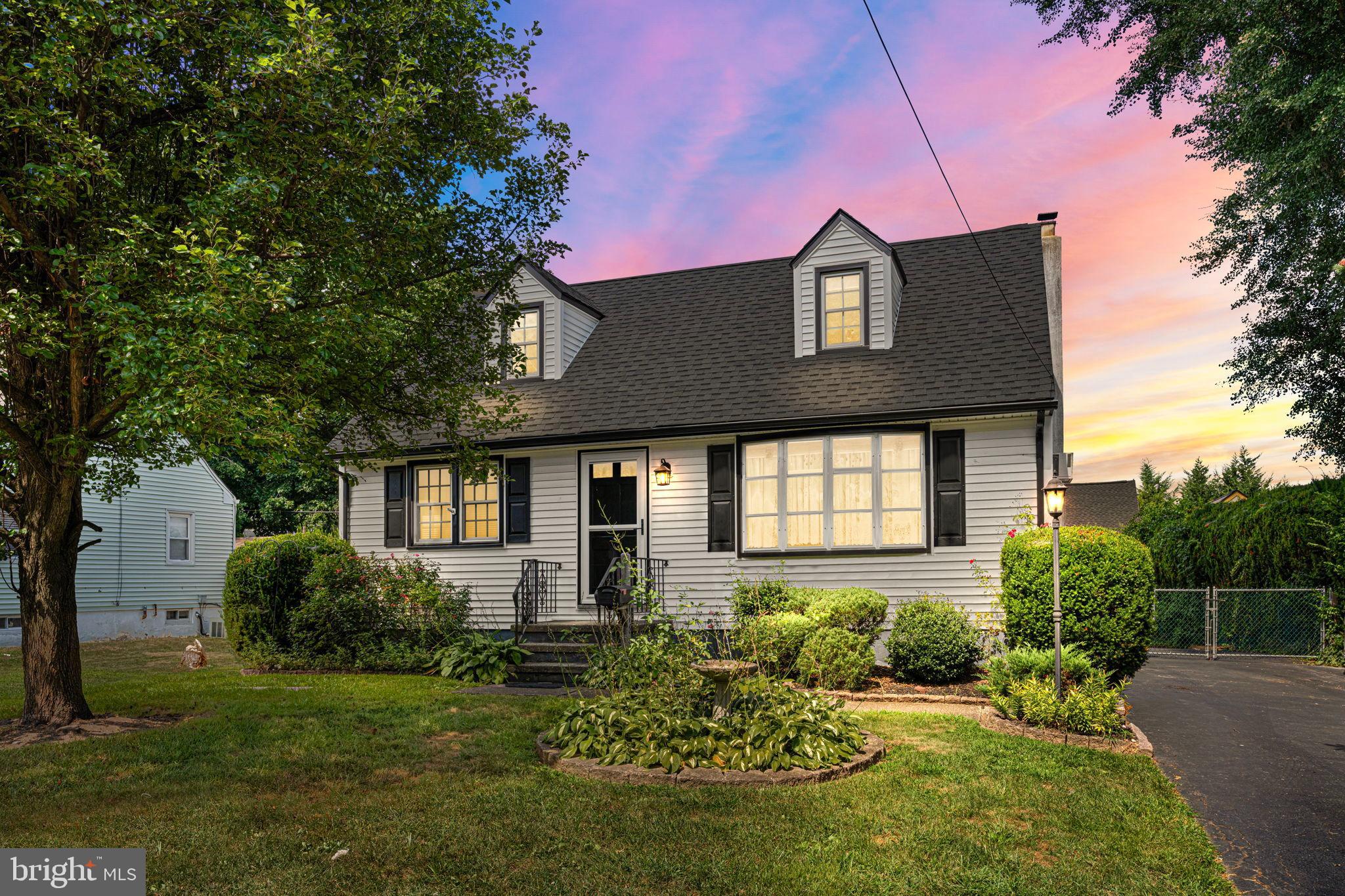 Welcome to 118 Althea Avenue, a charming Cape Cod nestled in the heart of Morrisville Boro. Bursting with character and potential, this 4-bedroom, A Newer Roof and Siding Adds so much value , This 1.5-bath home offers a versatile layout and plenty of inviting spaces for everyday living and entertaining. Step inside to find a warm and welcoming kitchen featuring an abundance of natural wood cabinetry, classic black appliances including a wall oven and adjacent cooktop, and ample counter space for meal preparation. A large pass-through window opens to the adjacent living area, creating a more connected feel between the rooms. A door off the kitchen leads directly into the sunroom, where two skylights flood the space with natural light—perfect for enjoying your morning coffee or relaxing with a good book. The main level offers two bedrooms and a full bathroom, while the upper level provides two additional bedrooms and ample closet space, accommodating a variety of living arrangements. The partially finished basement adds even more versatility, complete with a cozy wood-burning stove and a built-in bar, making it an ideal space for gatherings, hobbies, or simply unwinding by the fire. Outdoors, you’ll find a generous yard with space for gardening, entertaining, or play. This home combines original charm with thoughtful updates, providing the perfect opportunity for its next owner to move in and make it their own. Conveniently located near shopping, restaurants, parks, and major commuting routes, 118 Althea Avenue is a true gem with endless potential.