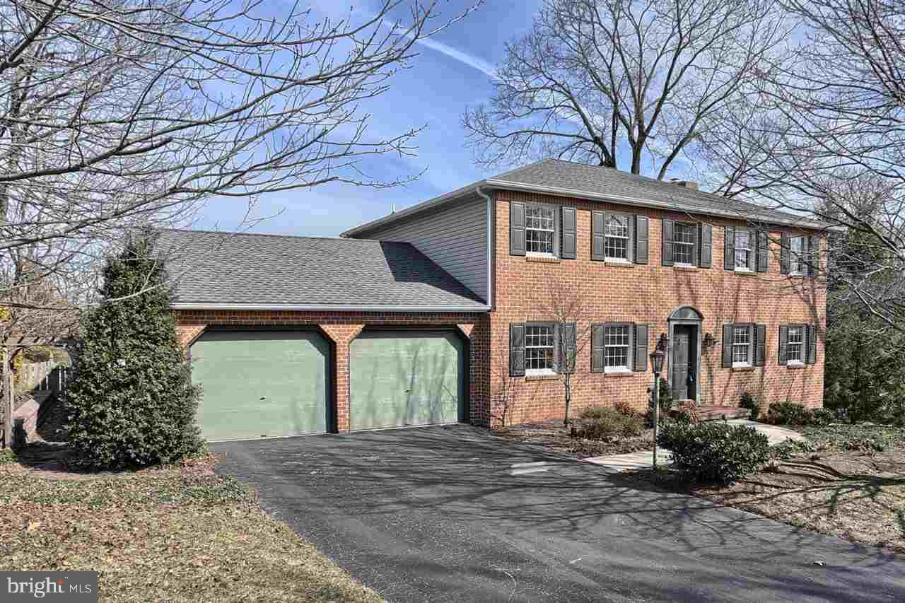 Why build when you can move right in to this amazingly upgraded home! Beautiful, bright, brick front, water views from the rear deck...boasts so many upgrades, too numerous to mention! See list attached! Two story foyer, open living area, all freshly painted, meticulously maintained w/custom kitchen, zodiac counters, custom baths & closets too! You will fall in love w/all this home has to offer. Finished lower level, 2 car garage/storage above. Conveniently located! Come see it today. All appliances convey!