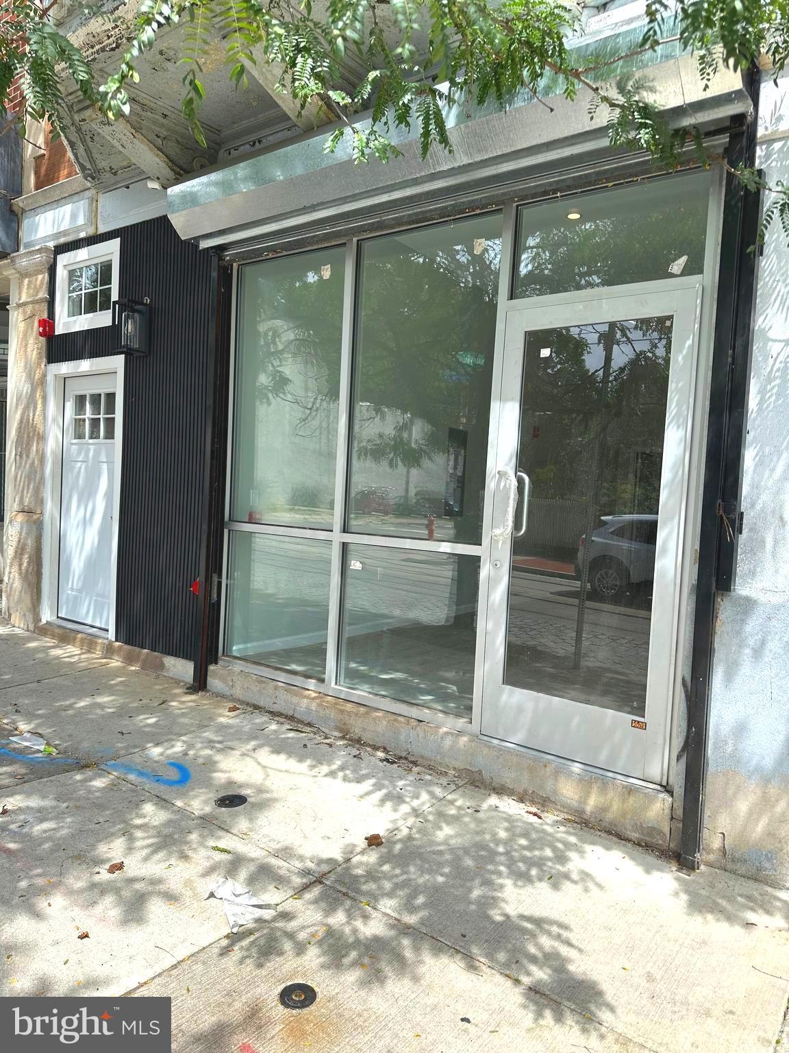For lease is a light filled store on busy Germantown Avenue. The building has been completely renovated and is awaiting your business. Foot traffic and street parking are plentiful. This business space has a glass wall in the front with a remote controlled roll up/roll down security door for protection and peace of mind. The business space also has a side entrance that gives access to a front gate and breezeway. In the rear of the unit is a renovated, modern bathroom. The unit is heated and cooled by an energy efficient mini split HVAC system. This space would make for a perfect store, office, art gallery, or boutique. Come and take a look!